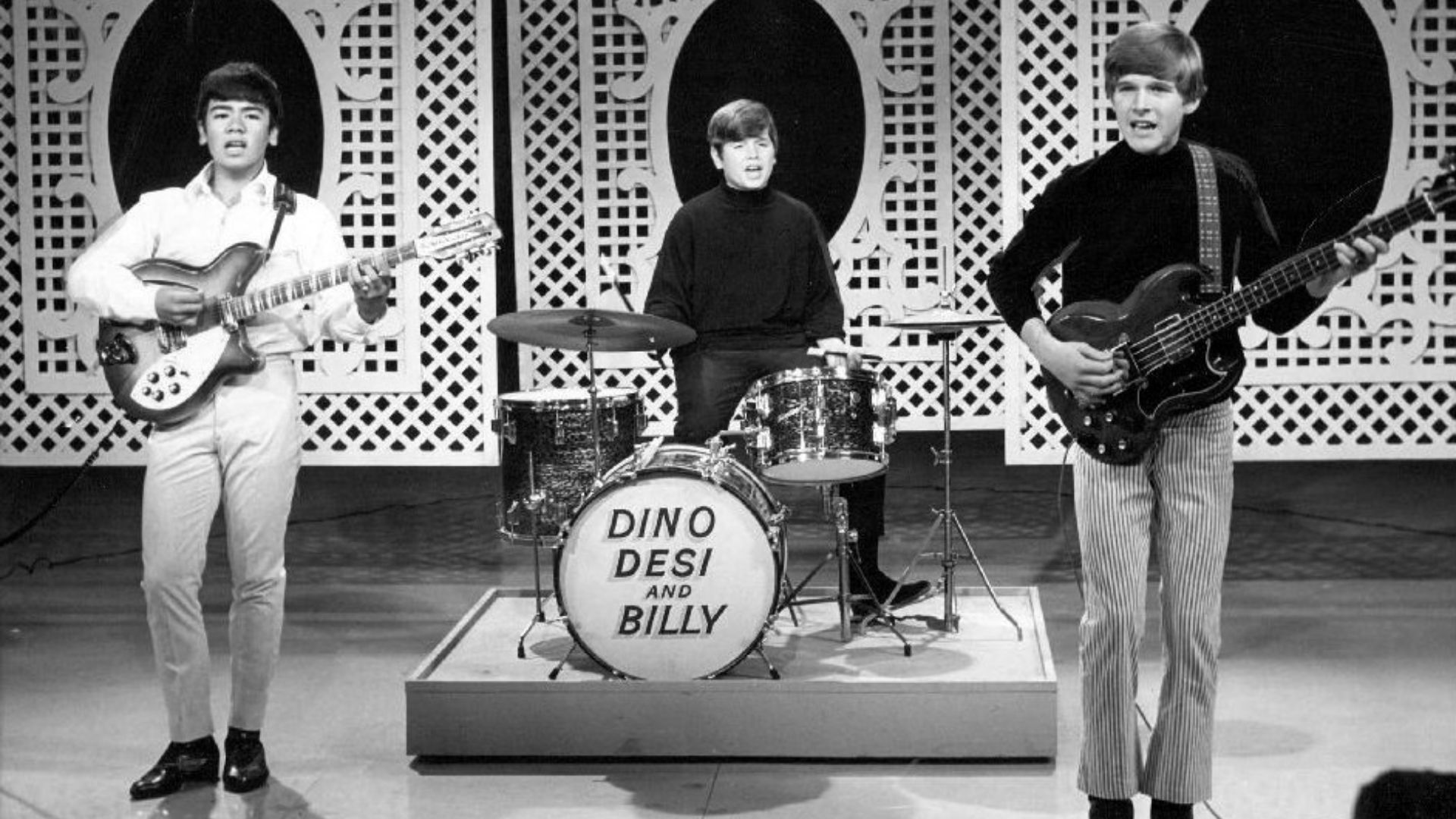 Photo of the musical group Dino, Desi and Billy performing on The Dean Martin Show.  From left: Billy Hinsche, Desi Arnaz, Jr. and Dino Martin, Jr.
