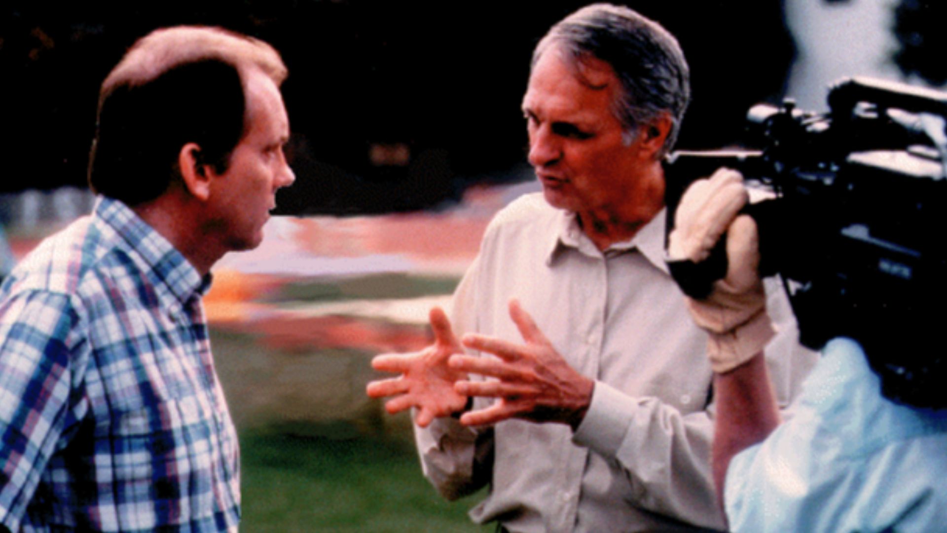 R.C. Michelson being interviewed by Alan Alda at the 1995 International Aerial Robotics Competition during the filming of Scientific American Frontiers.