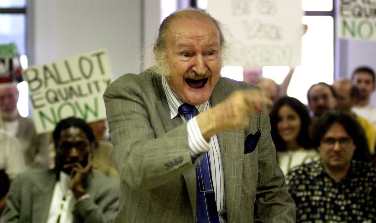 376668 04: Green Party member "Grandpa" Al Lewis, former actor on the television show "The Munsters," shouts at board members during a meeting of the New York City Board of Elections along with other Green Party supporters August 22, 2000, in New York. Lewis and the Green party members were demanding that the Green party be included on voting machines during upcoming primaries, rather than only being on paper ballots 