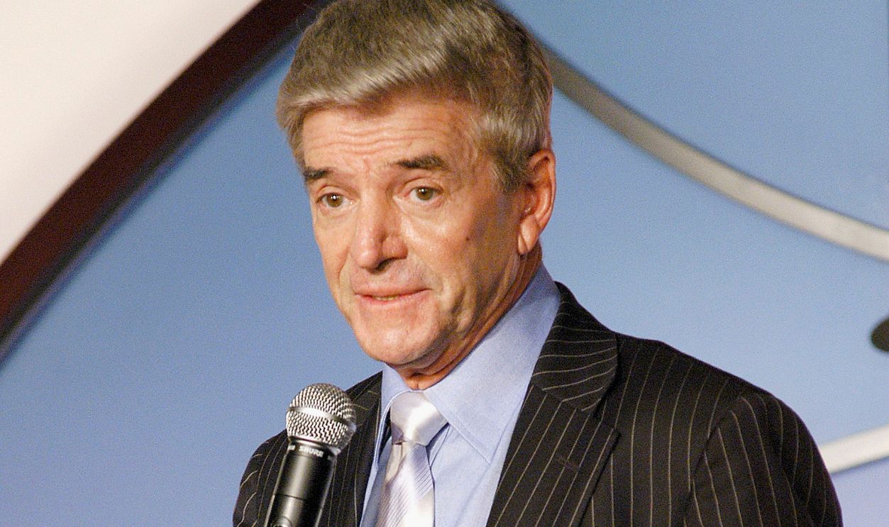 Getty Images - 50831329 - Comedian Tom Dreesen performs at the Laugh Factory opening in Times Square May 12, 2004 in New York City.