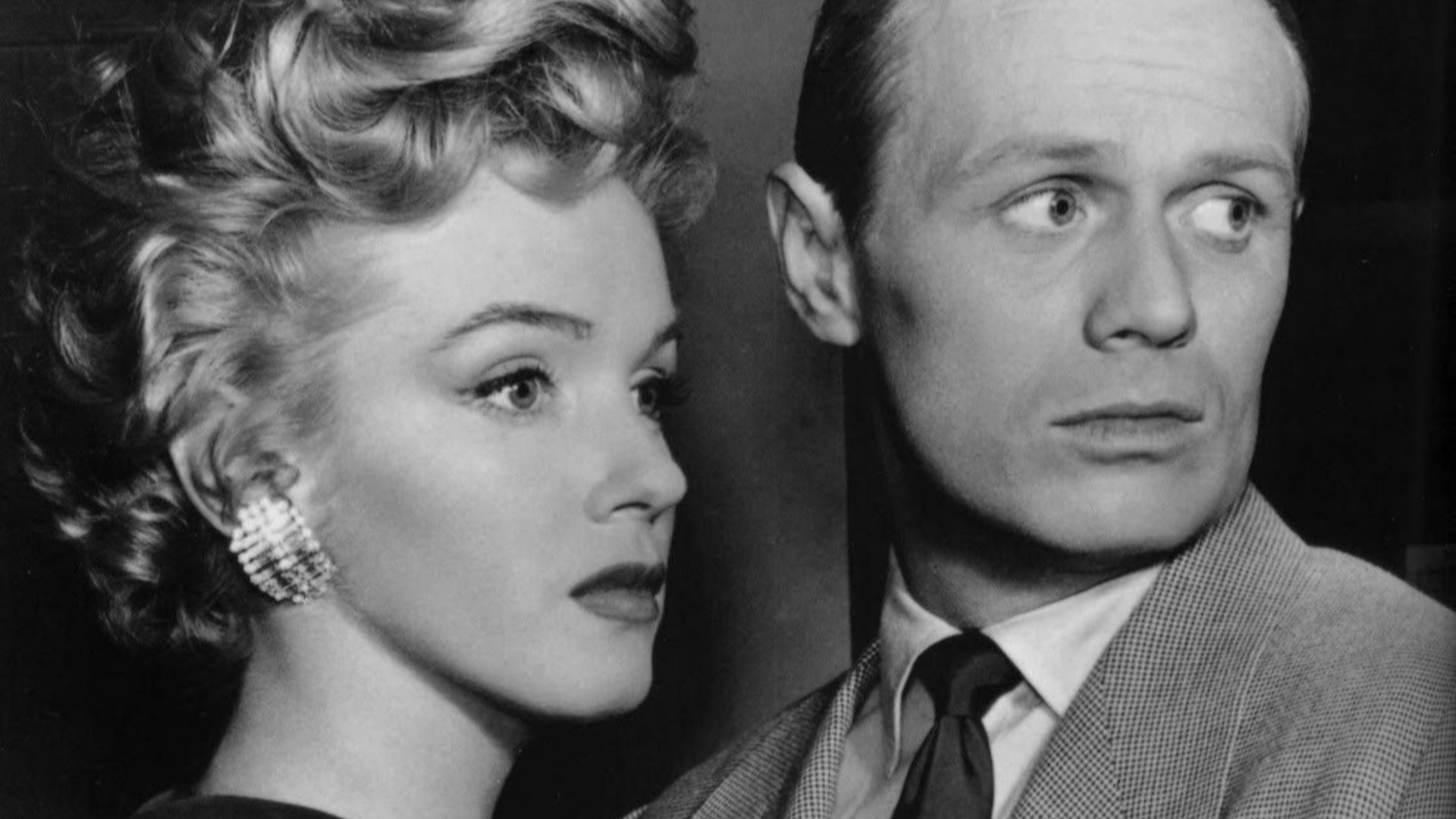 Marilyn Monroe and Richard Widmark in a promotional image for Don't Bother to Knock (1952)