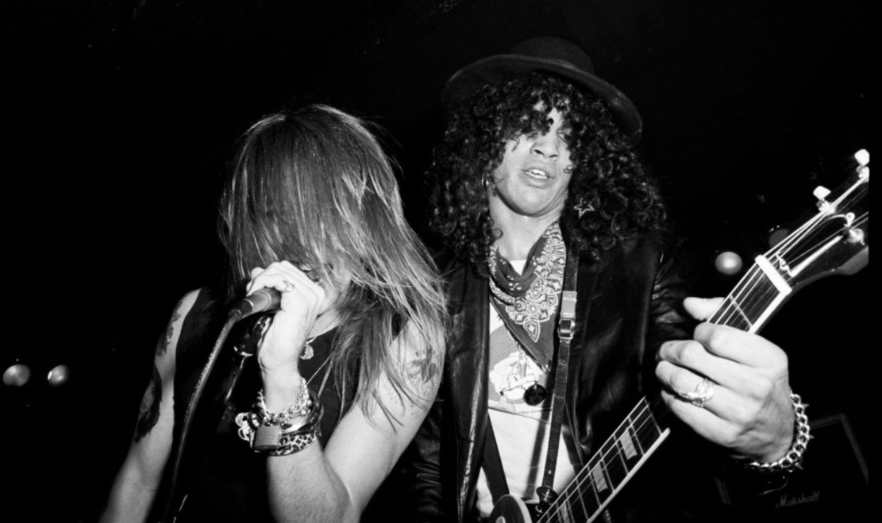 ANAHEIM, CA - OCTOBER 31: Axl Rose and Slash of the rock band Guns n' Roses performst at Radio City on October 31, 1985 in Anaheim, California.