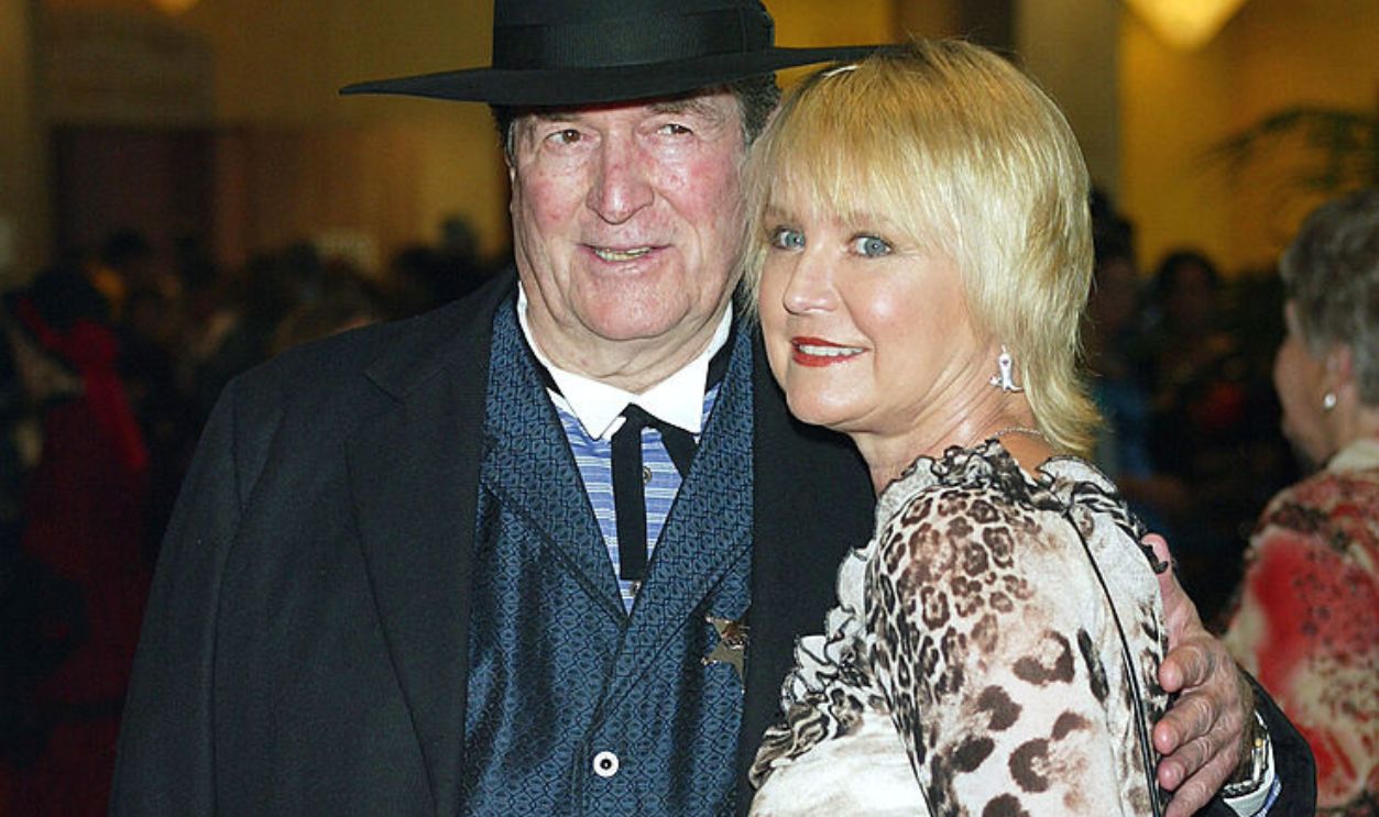 BEVERLY HILLS, CA - AUGUST 9: Actor Hugh O'Brian and date Virginia Barber arrive at the 21st Annual Golden Boot Awards at the Beverly Hilton Hotel on August 9, 2003 in Beverly Hills, California.