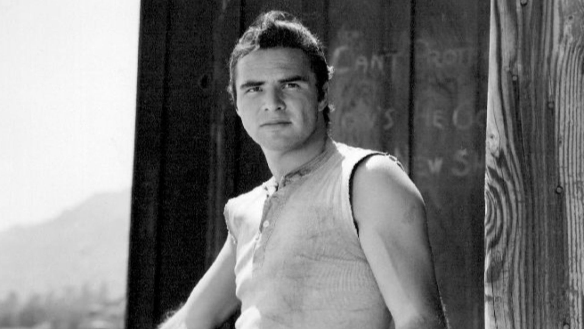 Publicity photo of Burt Reynolds as blacksmith Quint Asper from the television program Gunsmoke.
