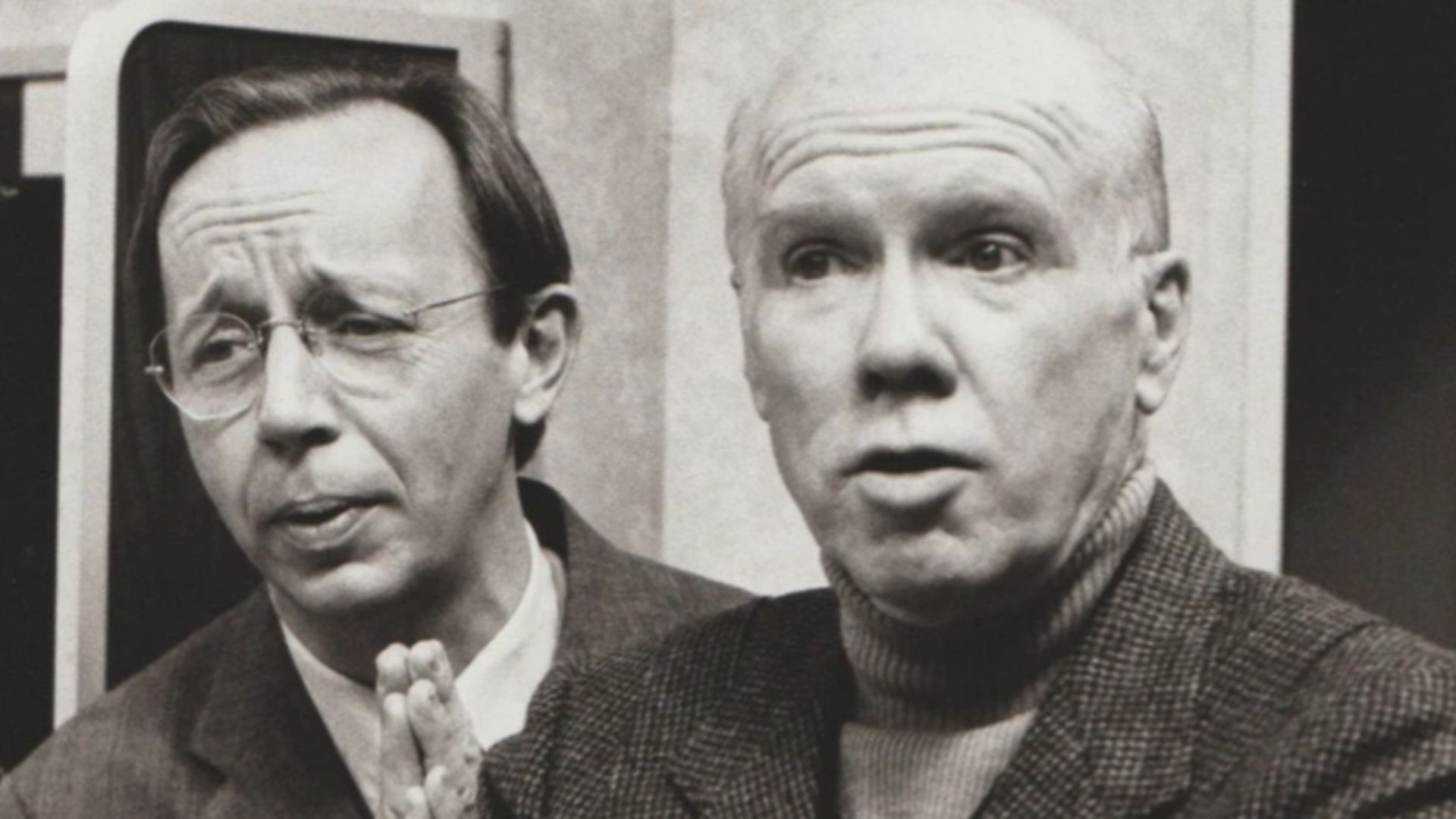 PLEADING – TV station manager Karl (Max Wright, left) pleads with stage manager Woody (John Fiedler) when the latter threatens to leave, in