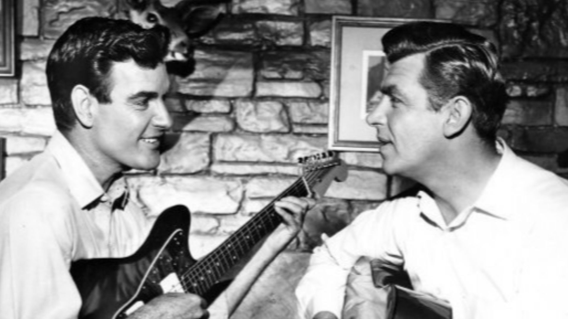 Photo of James Best and Andy Griffith from the television program The Andy Griffith Show. Best plays a former Mayberry resident, Jim Lindsey, who became a famous musician.