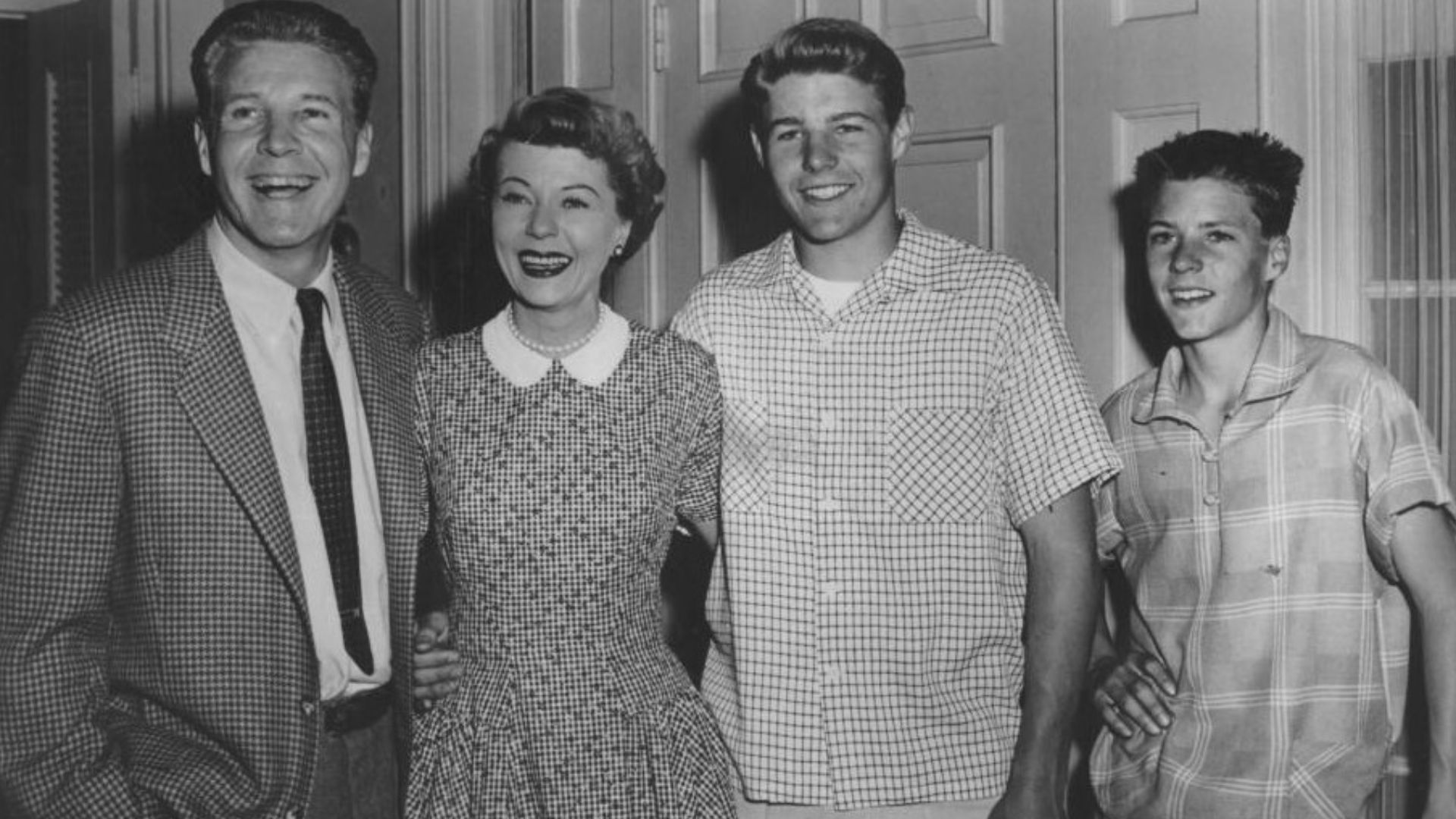 Publicity photo of American actors, (L–R) Ozzie Nelson, Harriet Nelson, David Nelson and Ricky Nelson promoting their roles on the ABC television series The Adventures of Ozzie and Harriet, circa 1955.