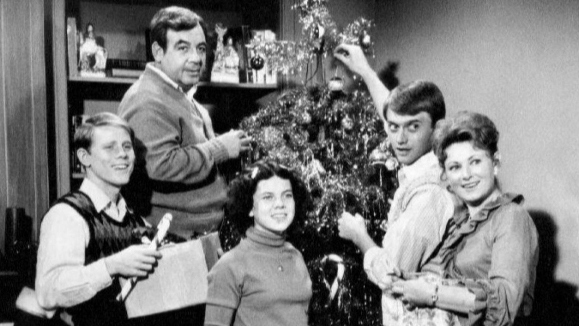 Publicity photo of the Cunningham family from the television program Happy Days.  The young man standing with Marion Ross is Randolph Roberts, who played the role of the Cunningham's older son, Chuck.  He was not a regular on the series.