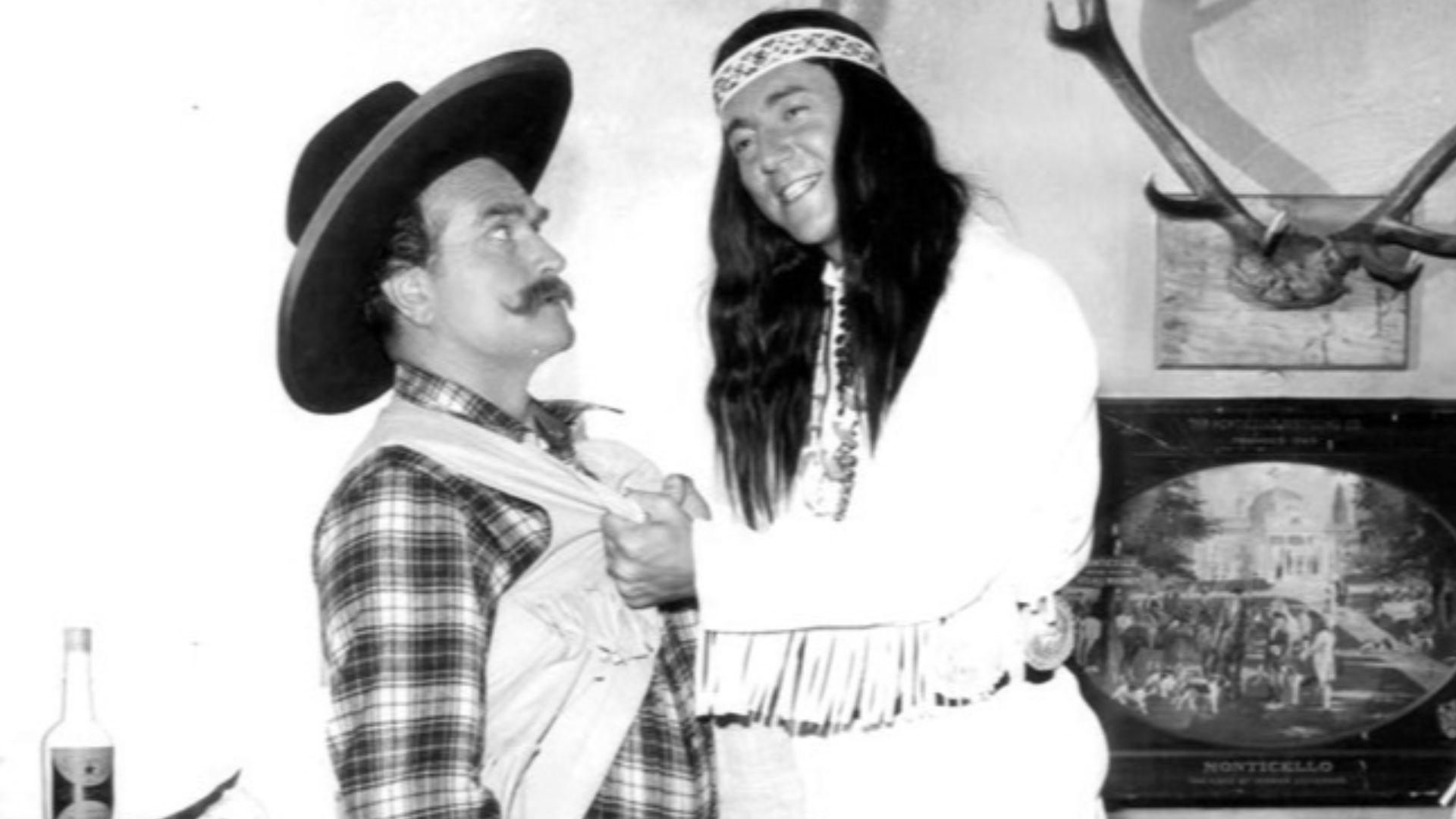Photo of Red Skelton and singer Bobby Darin in a skit from the television program The Red Skelton Show.  Skelton plays his