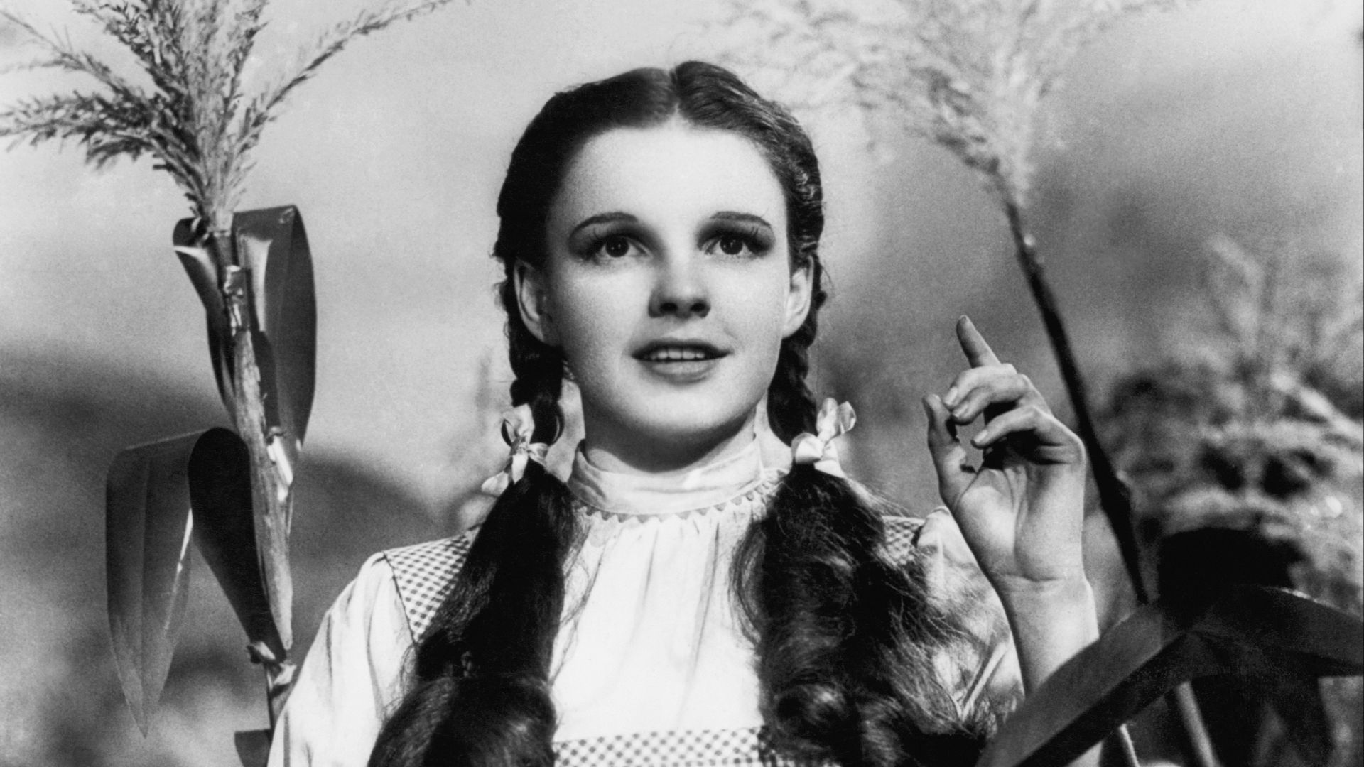 Publicity photo of American entertainer, Judy Garland as Dorothy Gale promoting the Sunday March 20, 1977 CBS television broadcast of the 1939 MGM feature film The Wizard of Oz.