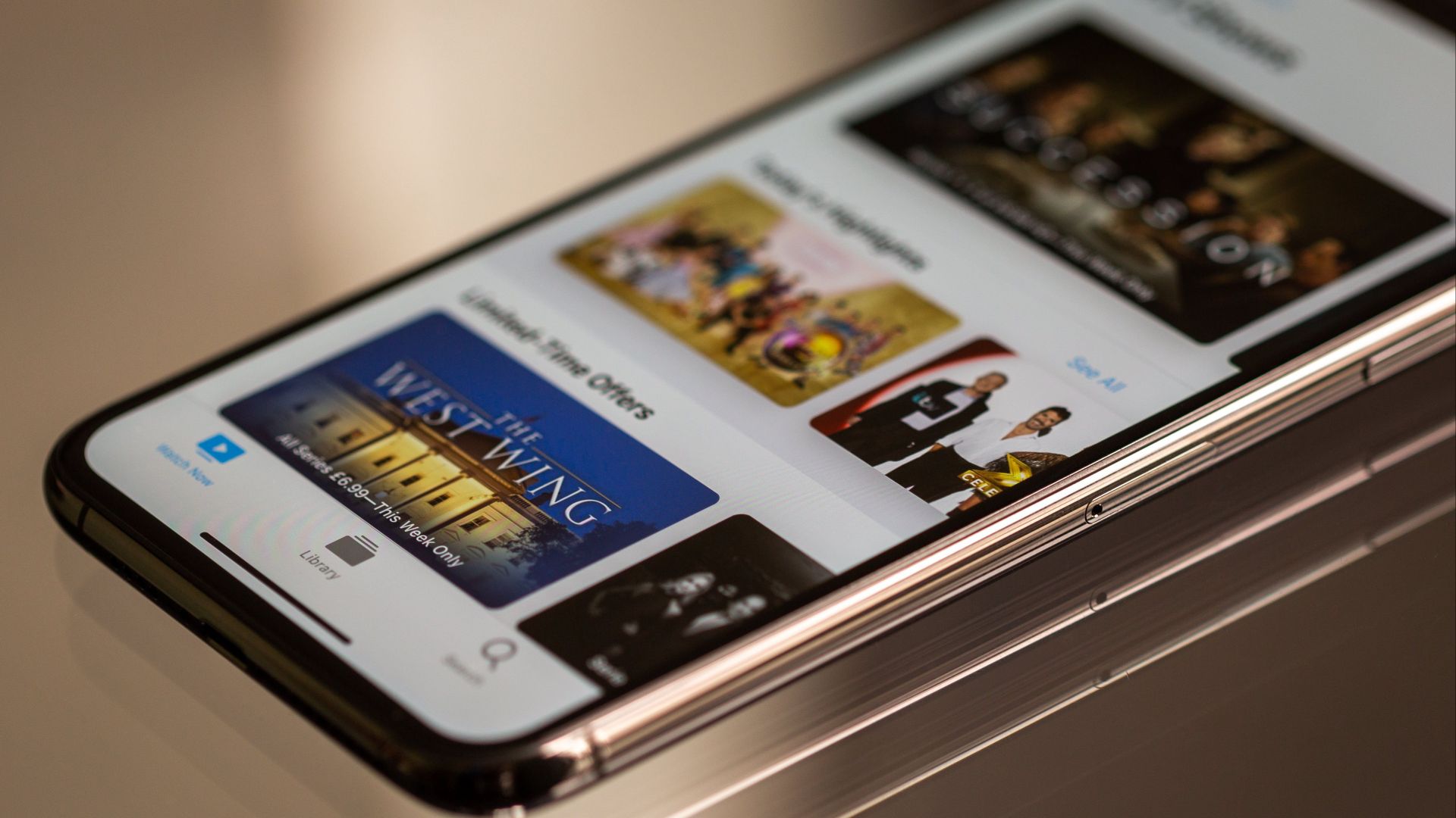 Close-up view of a smartphone featuring a streaming service interface, highlighting technology in modern entertainment.