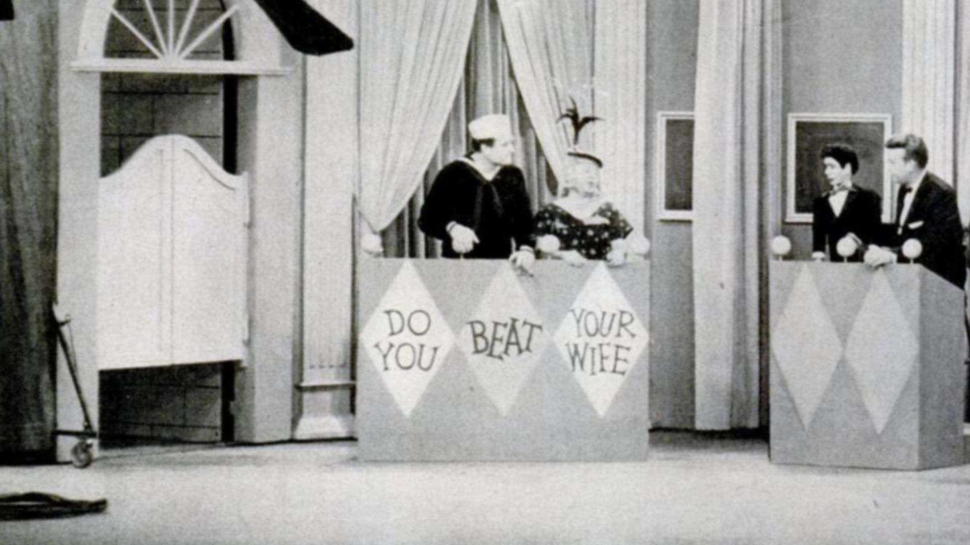 Dress rehearsal of The Red Skelton Show depicting Red Skelton and Mickey Rooney from two-page Montsanto ad in Life magazine. The sketch appears to be a parody of the CBS game show Do You Trust Your Wife?