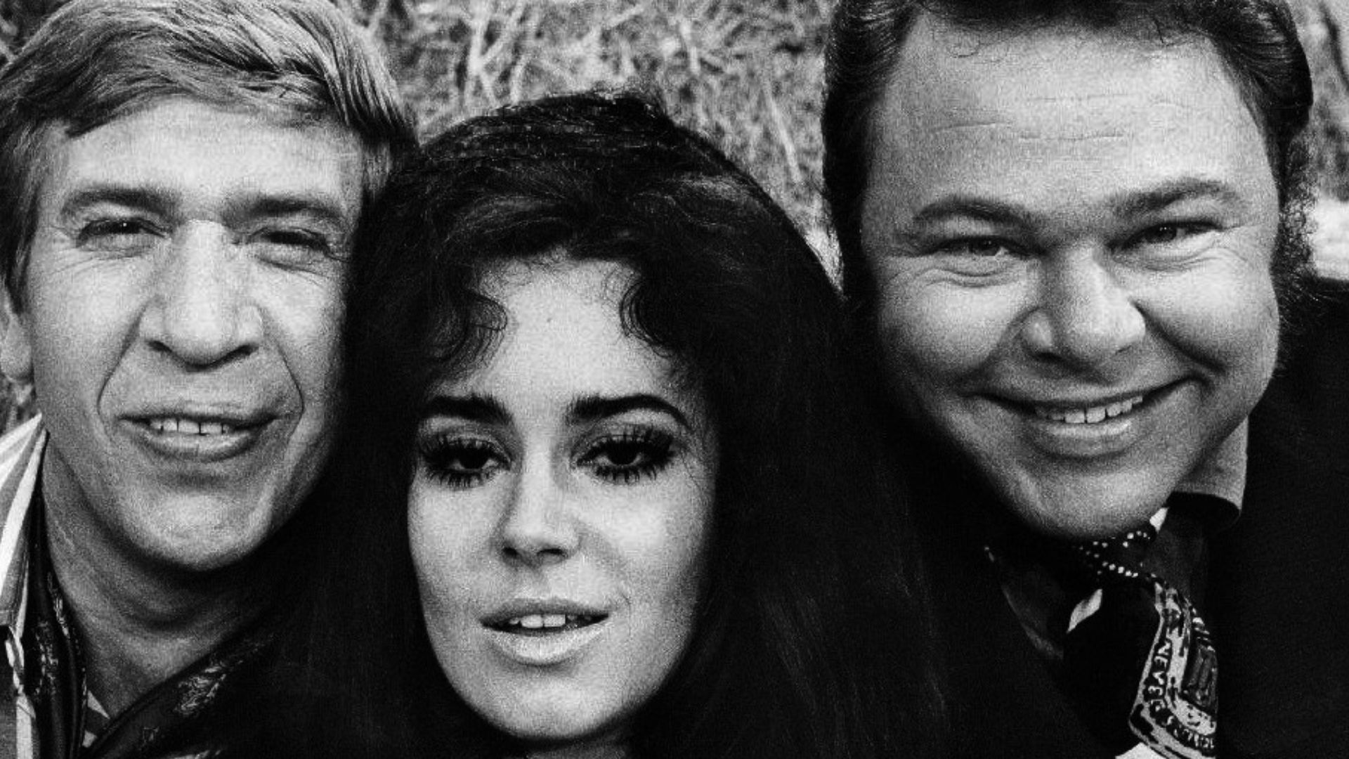 Photo of Buck Owens, Lisa Todd and Roy Clark from the television program Hee Haw.