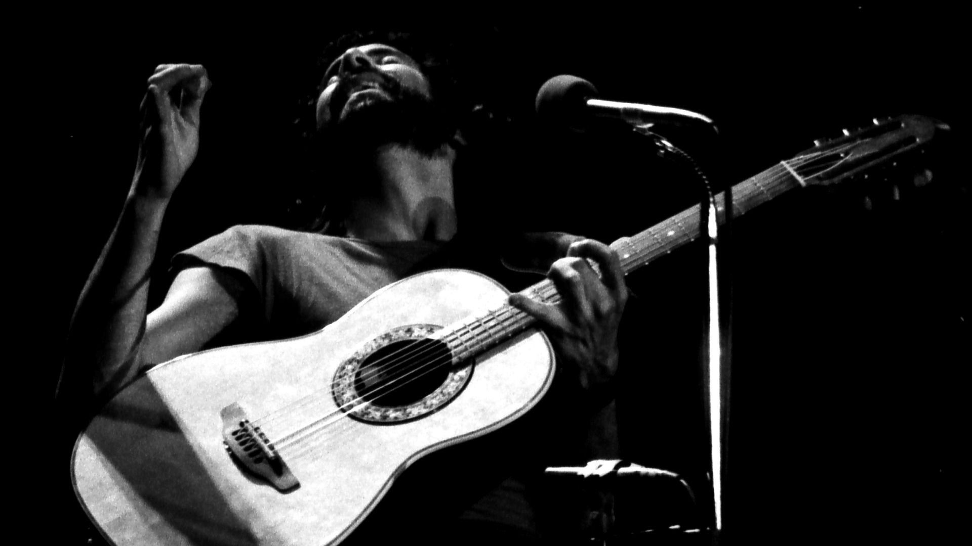 (Then) Cat Stevens in Boeblingen, Germany in 1976.   My first concert.  A lucky shot if there ever was one.  His expression kind of defines