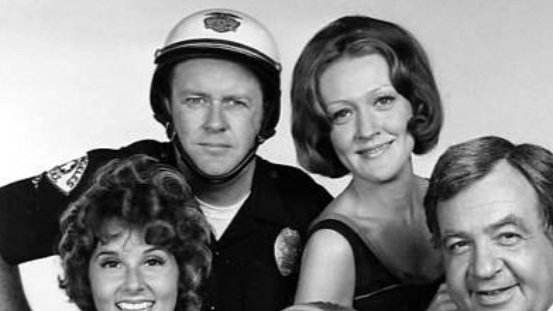 Publicity photo of The Sandy Duncan Show cast.  Front, from left: Pam Zarit, Sandy Duncan, Tom Bosley.  Back, from left: M. Emmet Walsh, Marian Mercer.