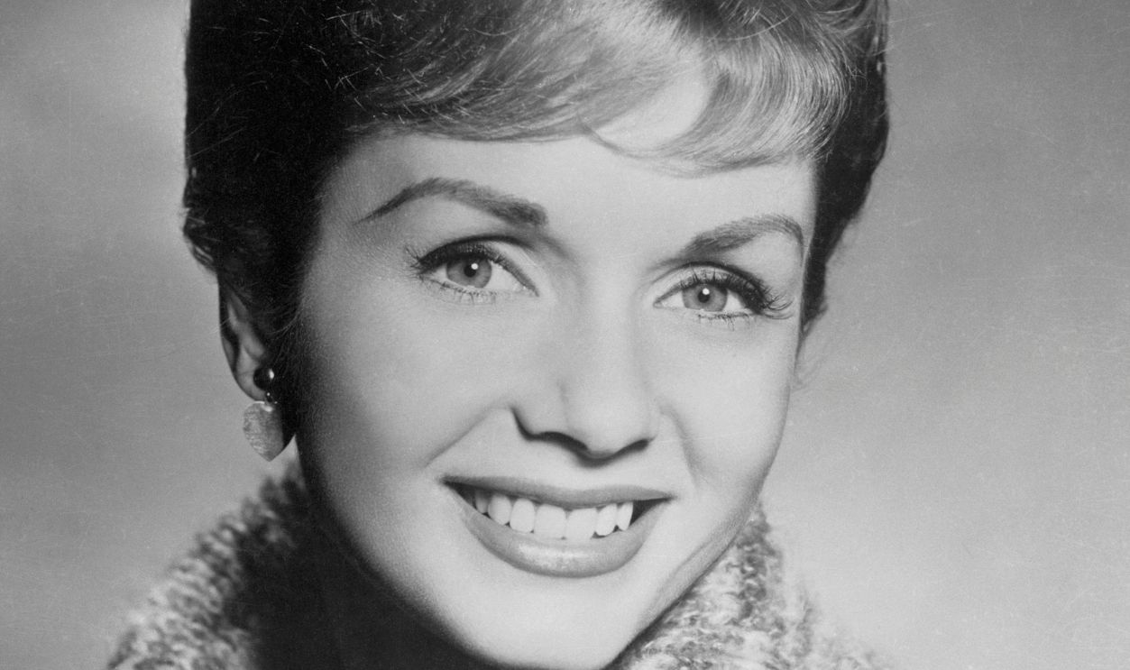 Portrait of Debbie Reynolds (Original Caption) Angered by fan magazine scandal stories...Hollywood, California: Debbie Reynolds (above), who can usually handle herself in a scrap, is angered and frustrated by fan magazine stories about her personal life. Miss Reynolds, who has stopped cooperating with most of the fan magazines, says that she hopes these magazines will see the light and stop printing scandal articles about her personal life.