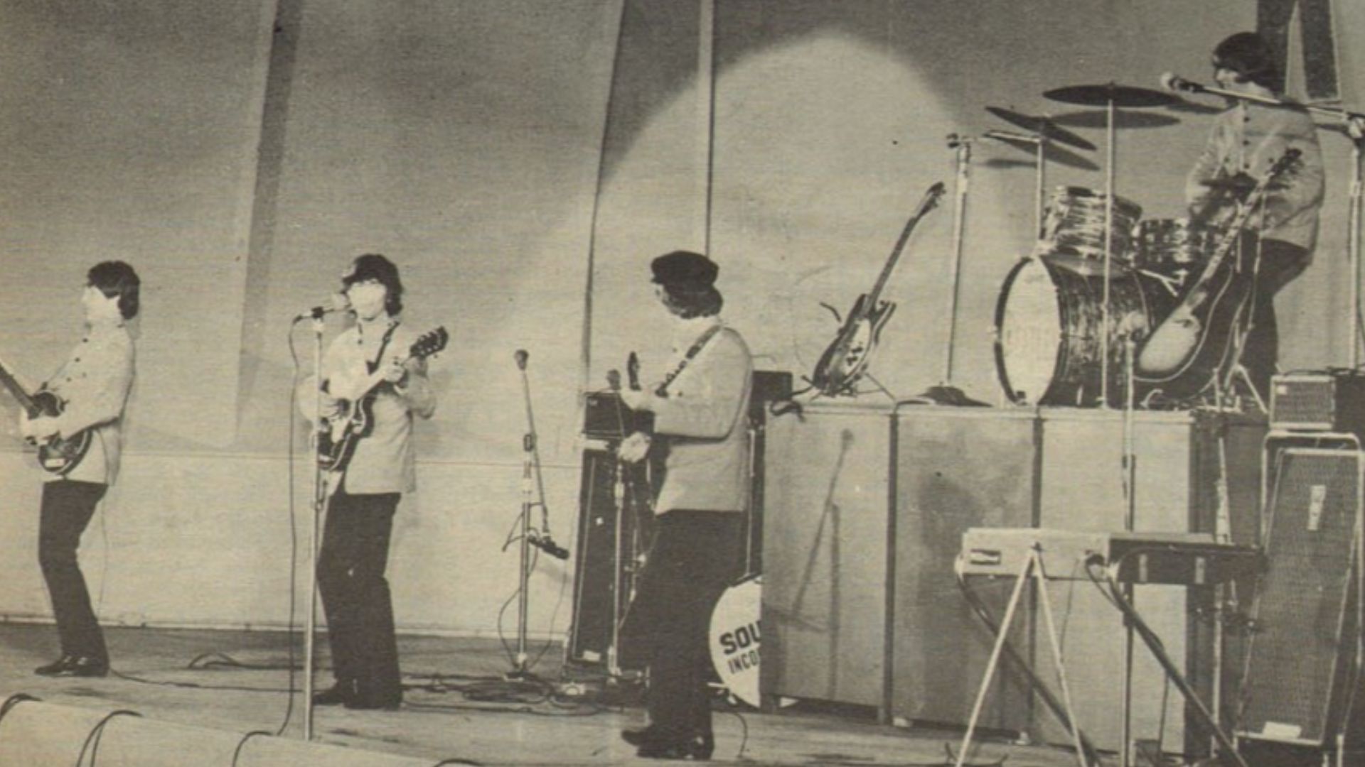 The Beatles performing at the Hollywood Bowl, August 1965. Featured in 2 October, 1965 issue of KRLA Beat (magazine)