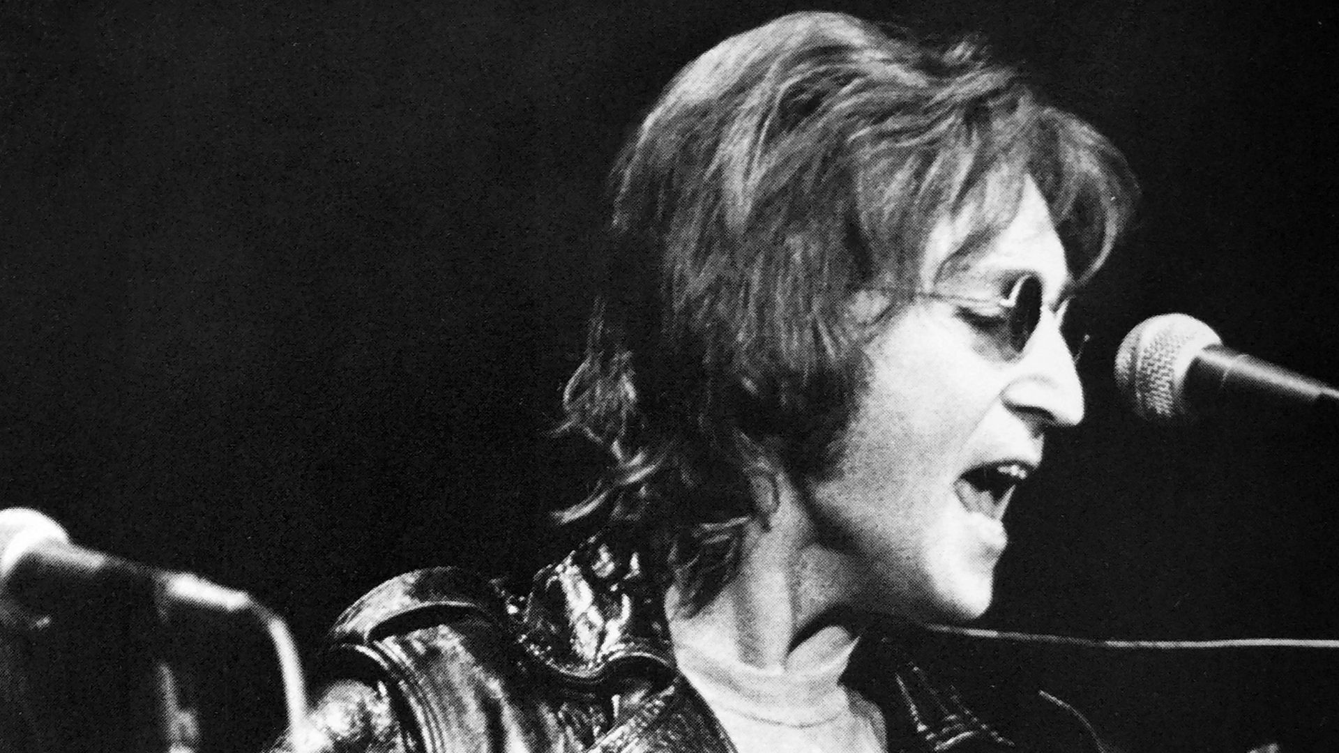 Yoko Ono and John Lennon at John Sinclair Freedom Rally at Crisler Arena in Ann Arbor, Michigan