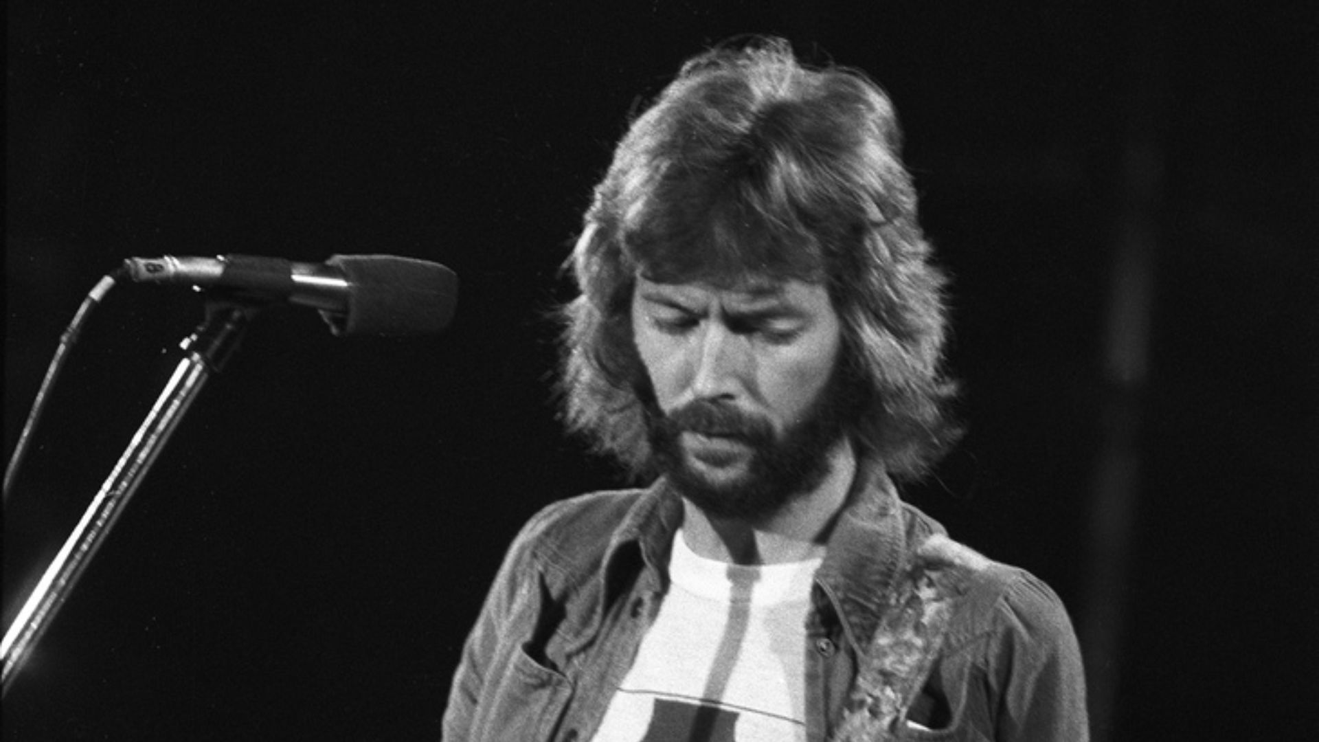 Eric Clapton - Swing Auditorium, San Bernardino, CA, There's One In Every Crowd Tour.
Aug. 15, 1975, Monochrome Frame 17.
Reduction of Tri-X Negative scan at 4000dpi. Shot with an Asahi Pentax w/200mm telephoto.

He's playing Blackie.