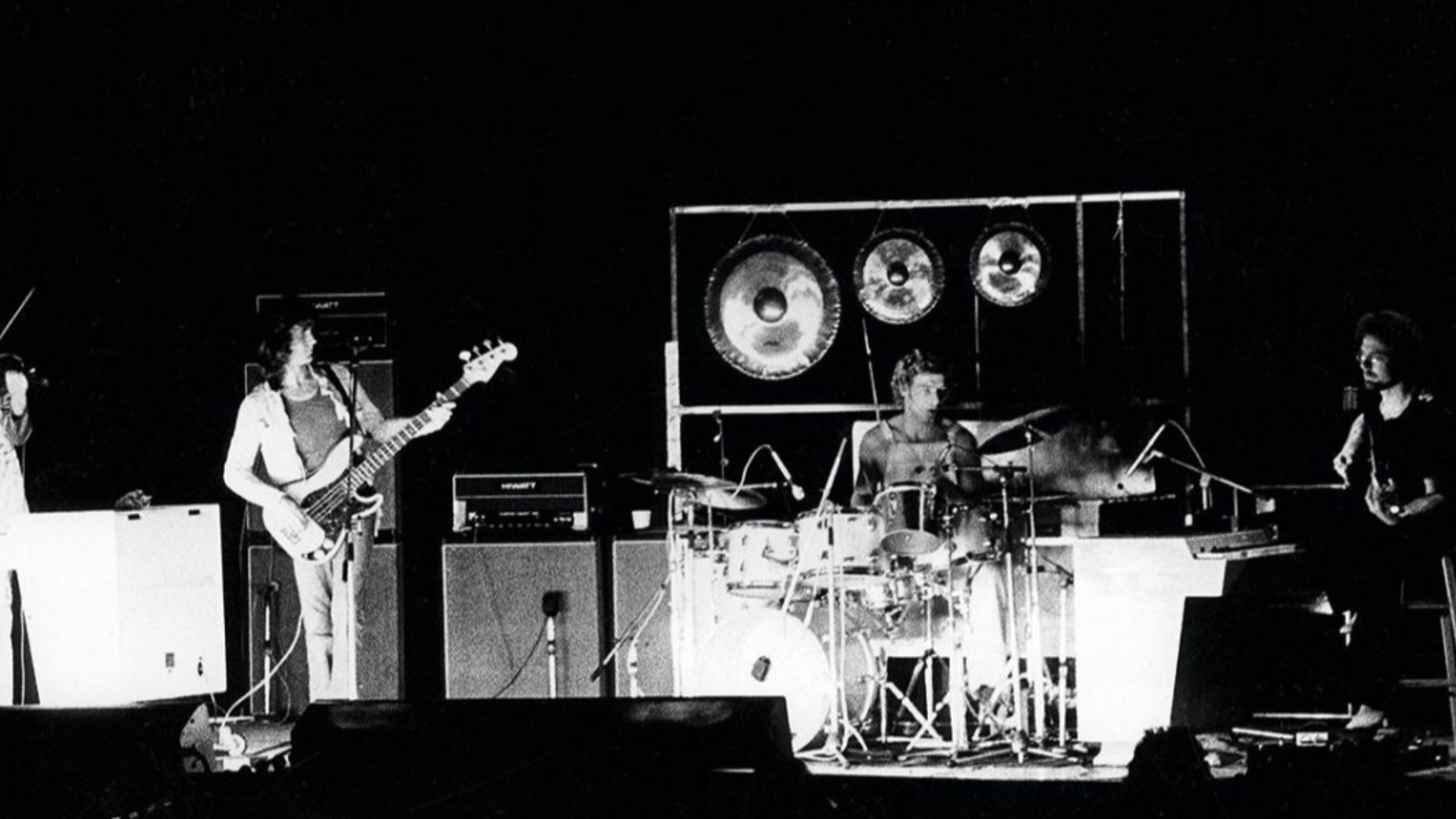 The English rock band King Crimson playing in a concert in 1973:


D. Cross (violin), J. Wetton (bass), B. Bruford (drums) and R. Fripp (guitar).