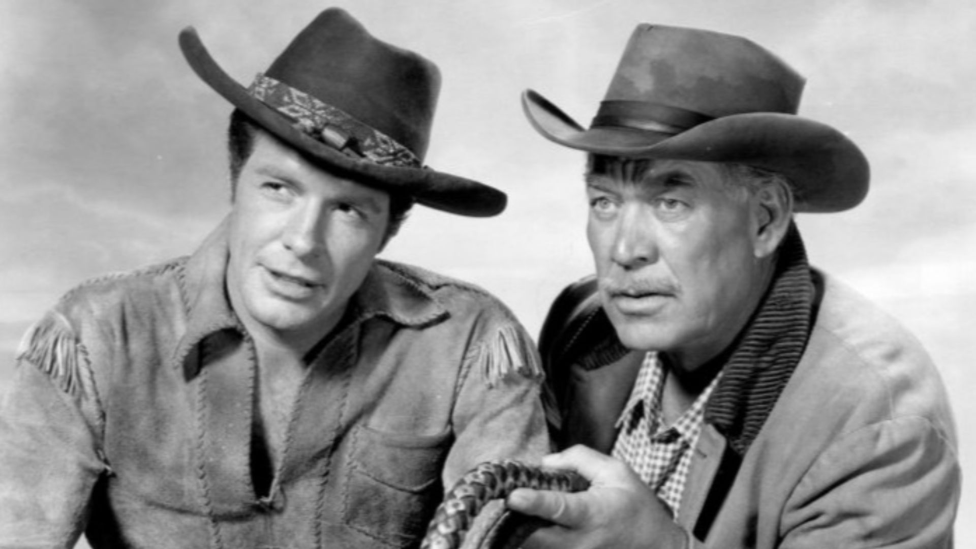 Photo of Robert Horton as Flint McCullough and Ward Bond as Seth Adams from the television program Wagon Train.  McCullough's role was that of the wagon train's scout while Adams was its wagonmaster.