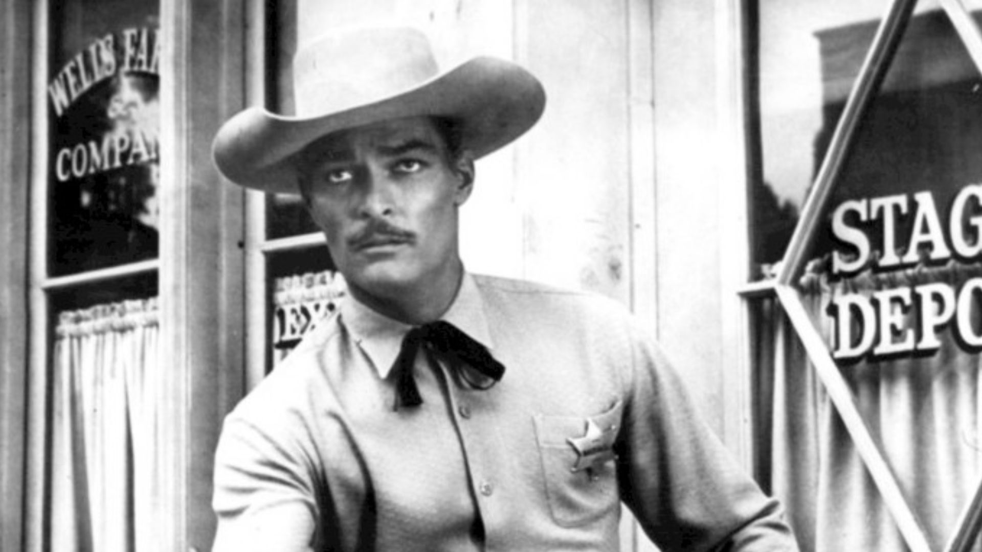 Photo of John Russell as Dan Troop from the television program Lawman.