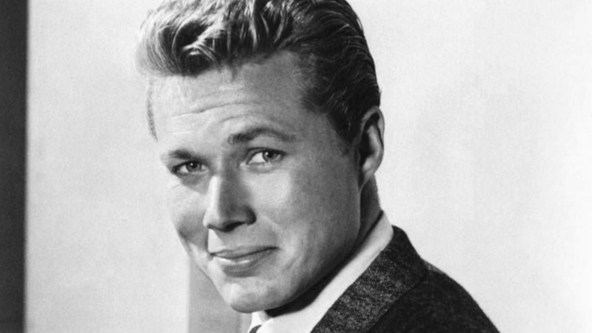 Photo of actor John Smith. The film's original title was Mock Trial. The title was changed to Handle With Care and it was released in 1958.