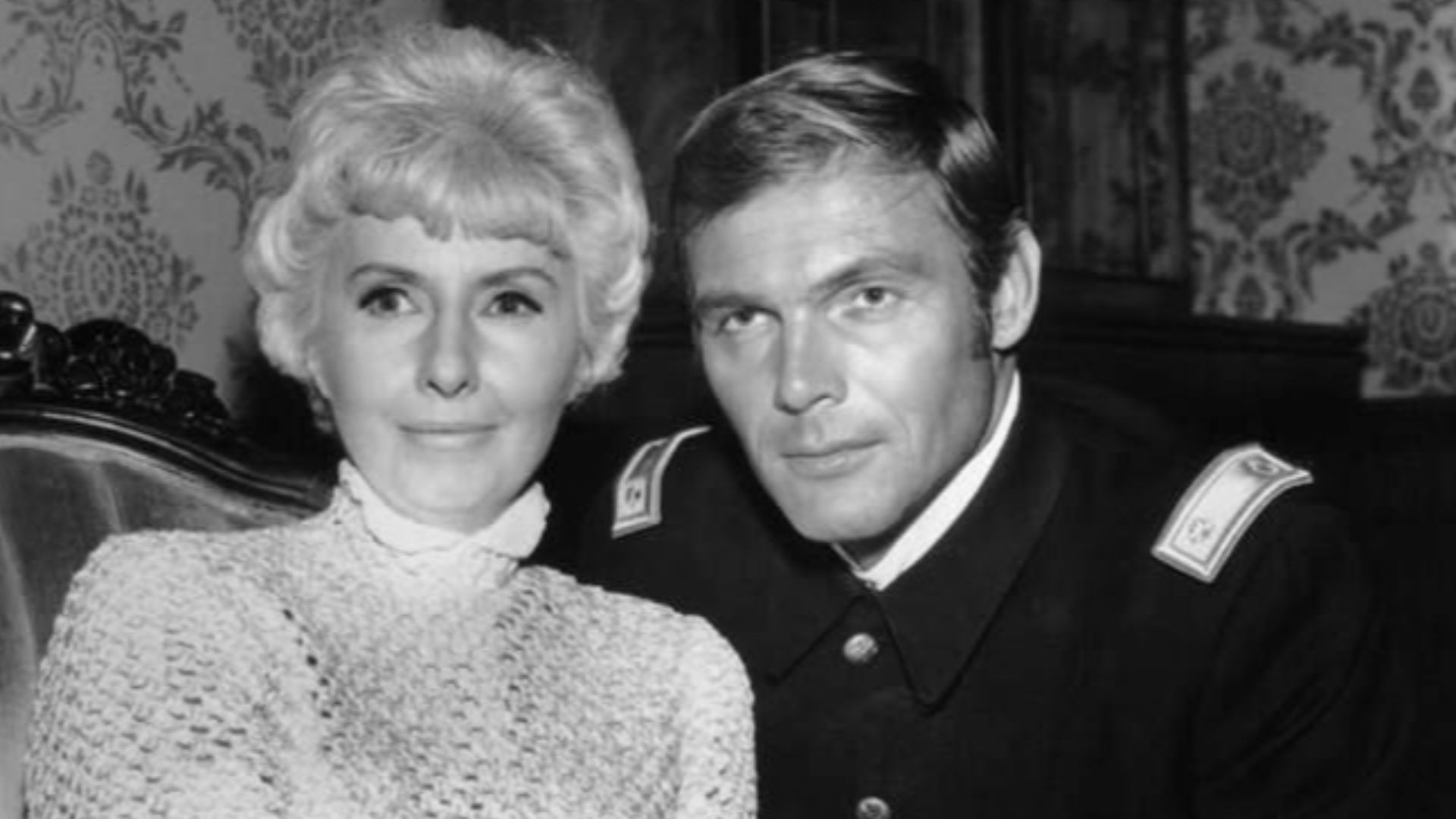 Photo of Barbara Stanwyck as Victoria Barkley and guest star Adam West as Major Jonathan Elliot from the television program The Big Valley.  The episode is