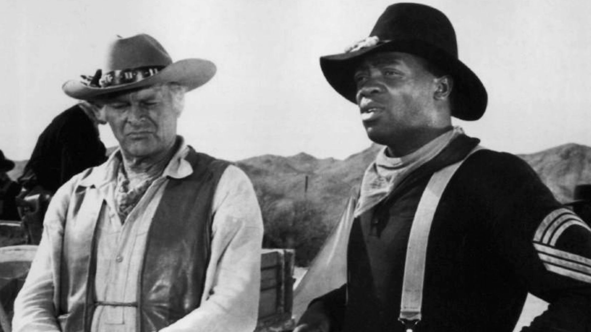 Photo of Leif Erickson as John Cannon and Yaphet Kotto as the leader of an all African-American group of cavalry soldiers from the television program The High Chaparral.