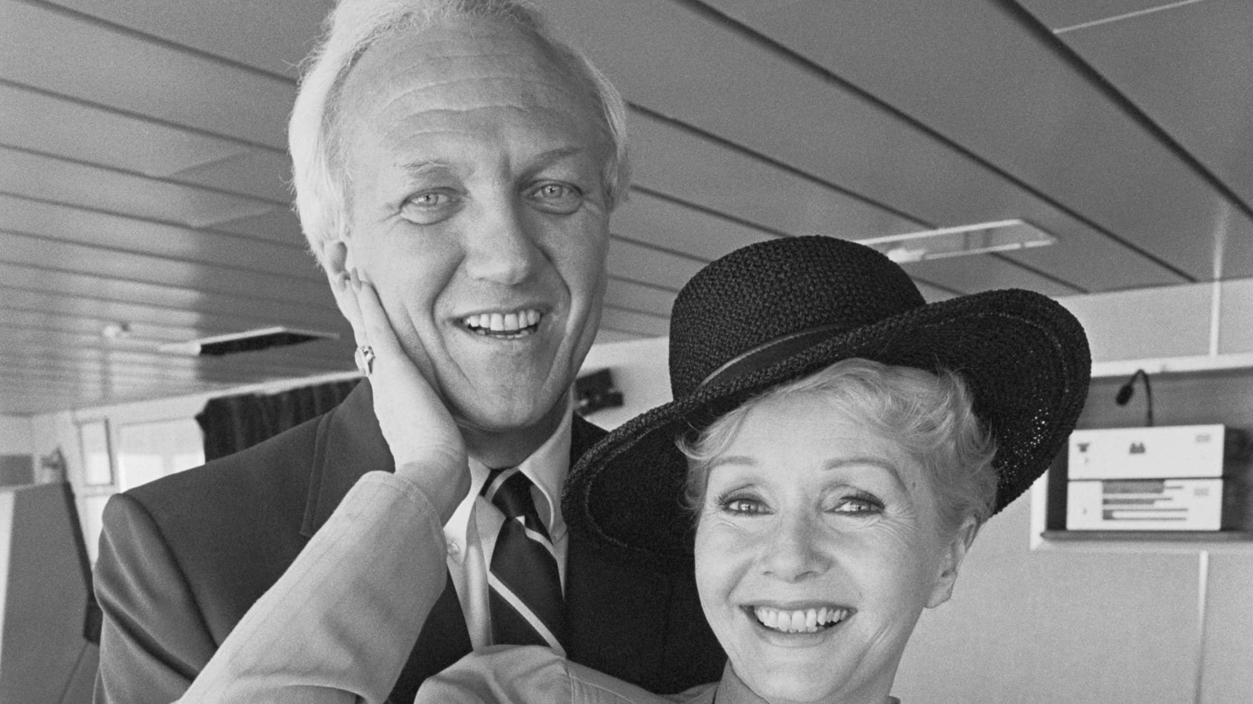 Debbie Reynolds Posing with (Original Caption) Miami Beach, Fla.: Actress Debbie Reynolds and her new husband Virginia Developer Richard Hamlett pose for a pre-honeymoon photo on the bridge of the S.S. Norway Carribean cruise ship. The couple were married in a small private ceremony at the home of a friend on Miami Beach.