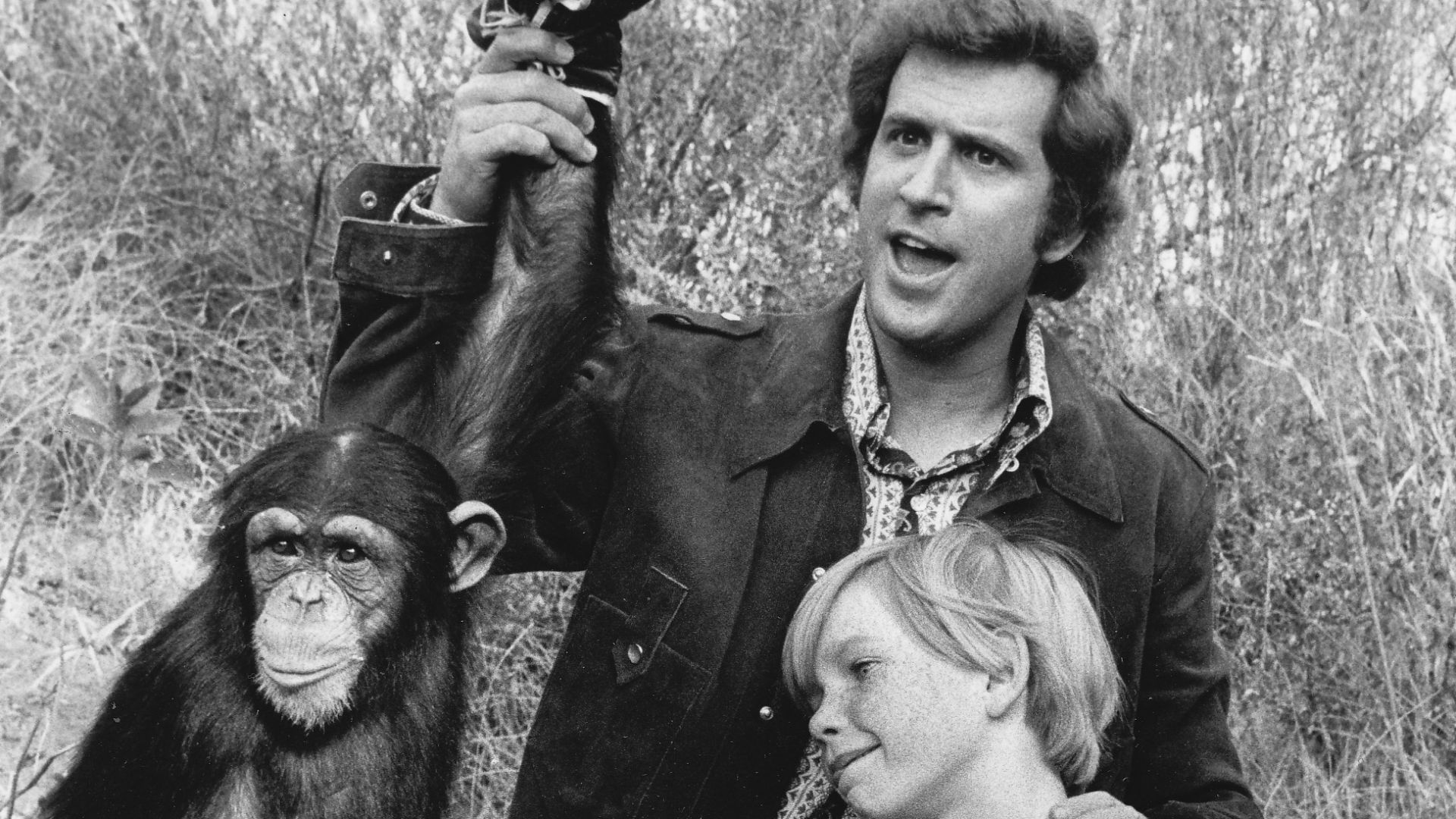 Publicity photo of American actors, Ted Bessell and Scott Kolden with chimpanzee performer,