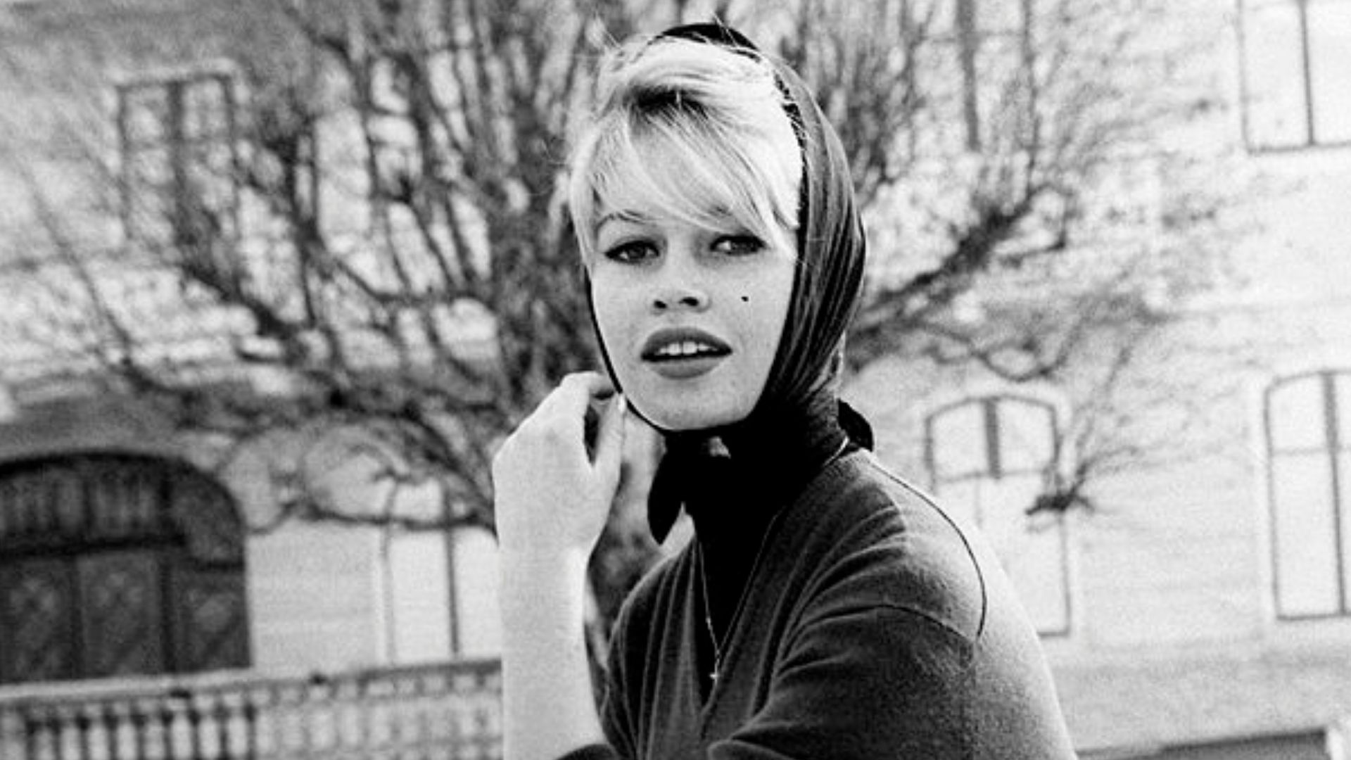 The French actress and model Brigitte Bardot posing on a curling field. Cortina d'Ampezzo