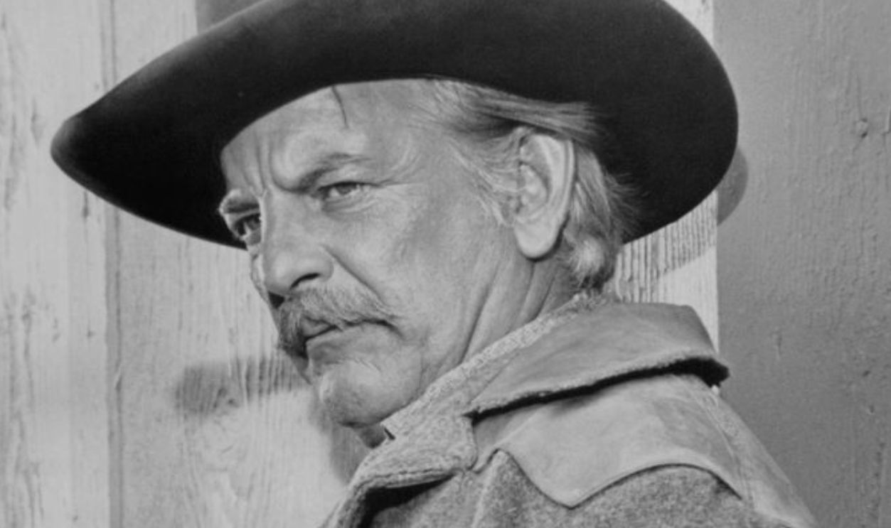 Denver Pyle envious of Audie Murphy's position as sheriff plots to kill Murphy in a scene from the film 'Gunpoint', 1966. 