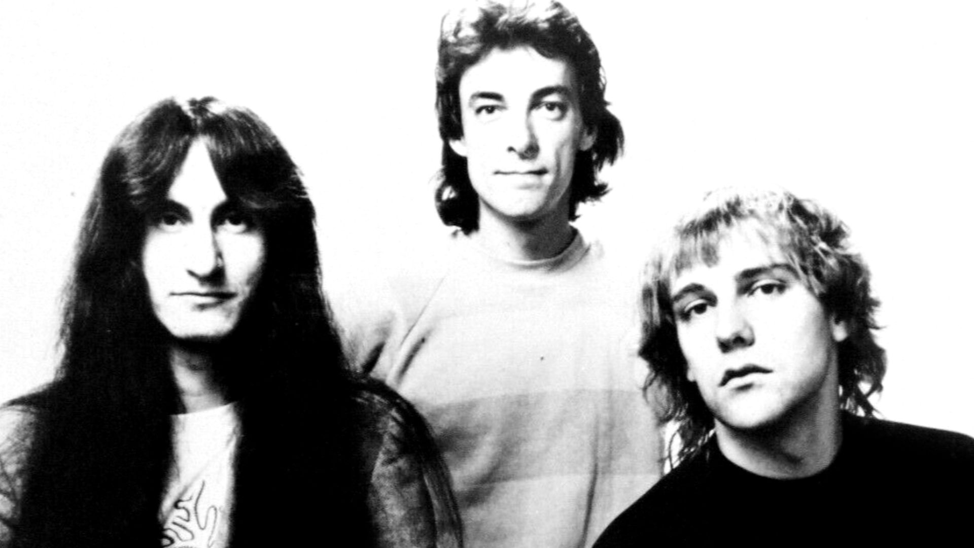 Promotional press photo of Canadian rock band Rush.