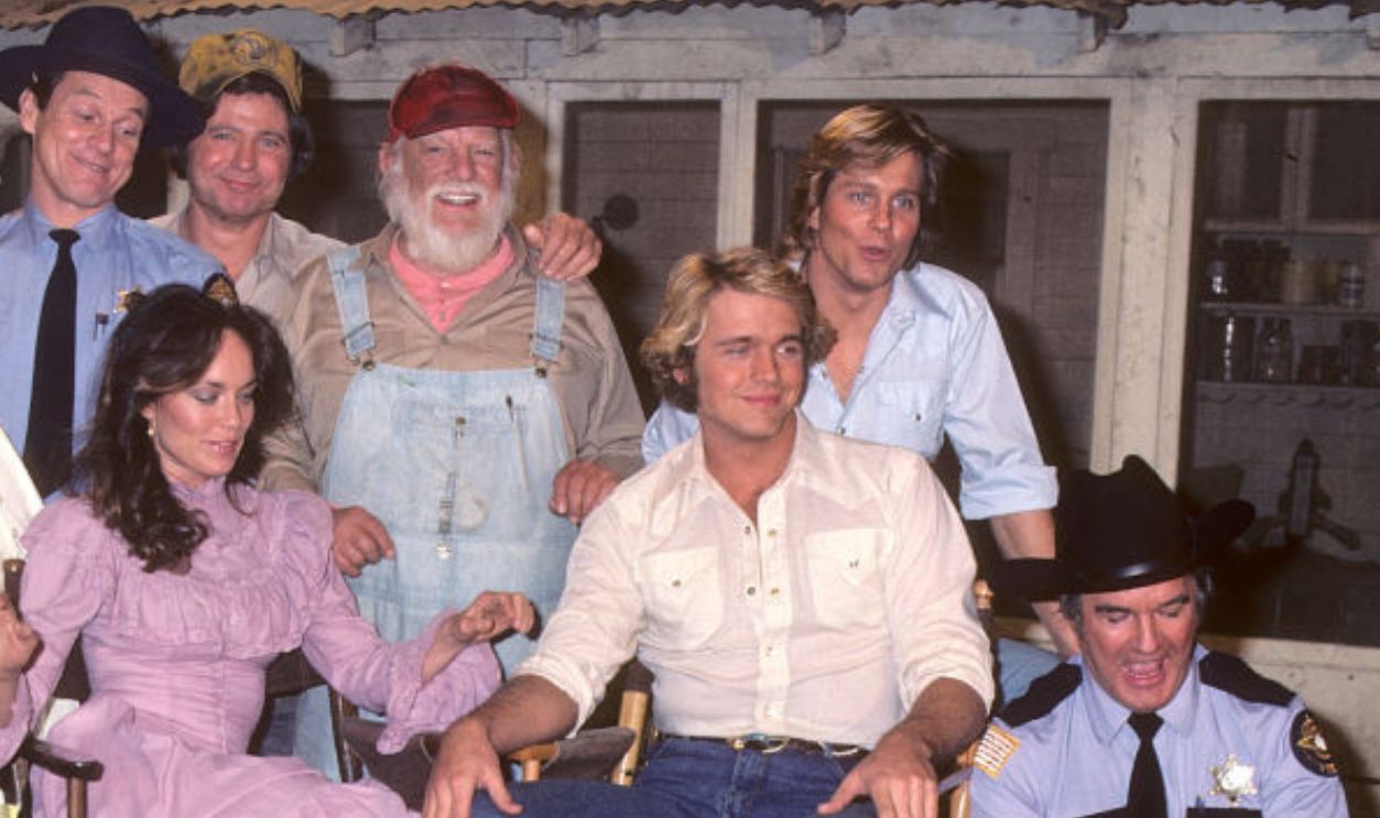 BURBANK, CA - FEBRUARY 2: Actor Christopher Mayer, actor Sorrell Booke, actor Sonny Shroyer, actor Ben Jones, actor Denver Pyle, actor Byron Cherry, actor Tom Wopat, actress Catherine Bach, actor John Schneider and actor James Best attend press conference: John Schneider and Tom Wopat talk about their return to
