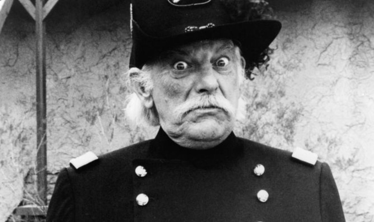 Denver Pyle as Col. Seymour Hawkins in a scene from the film 'Hawmps', 1976.