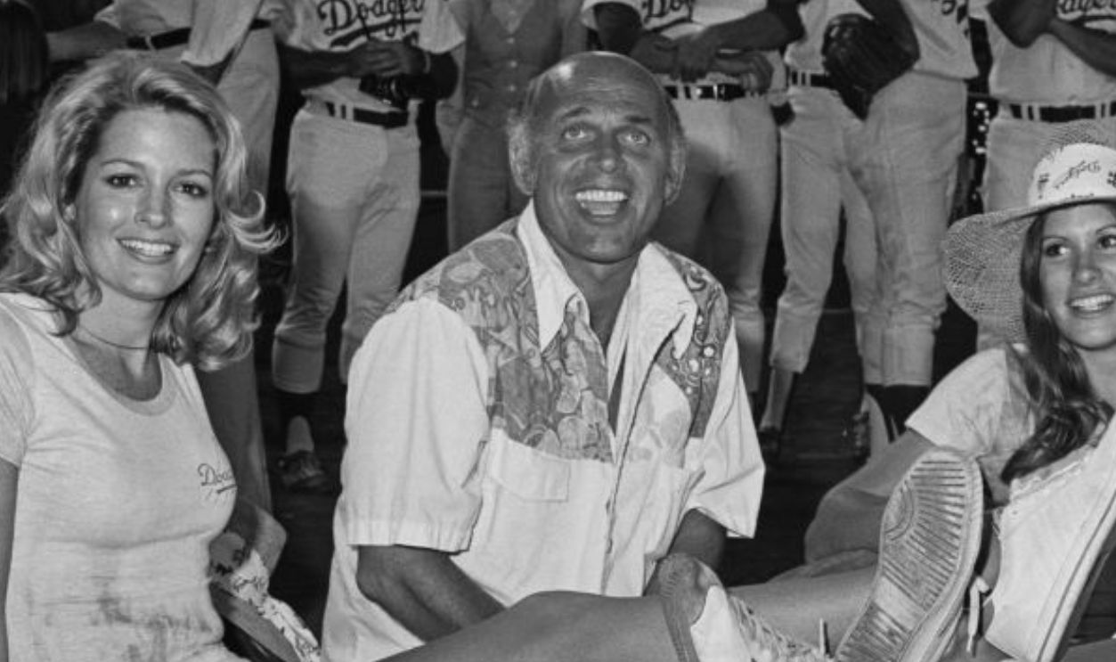 From left to right, actors Deidre Hall, Gavin MacLeod, Judy Norton and another man at a Los Angeles Dodgers versus celebrities baseball game, Los Angeles, USA, 21st August 1976.