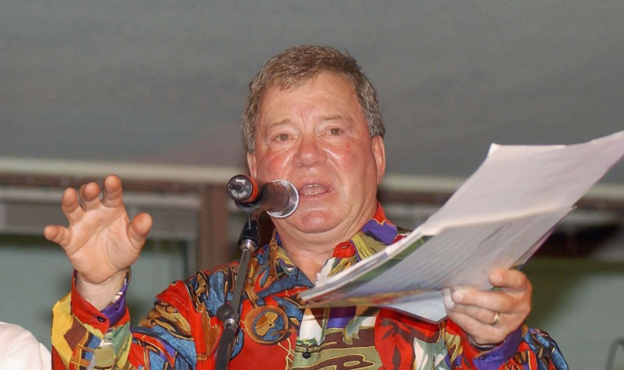 BURBANK, CA - MAY 1: Actor William Shatner (r) auctions a dinner prepared by Chef Dino Moody (l) at the 14th Annual Hollywood Charity Horse Show on May 1, 2004 at the Los Angeles Equestrian Center in Burbank, California. The event, hosted by Shatner, raises money for three local charities dedicated to improving the lives of special needs children.