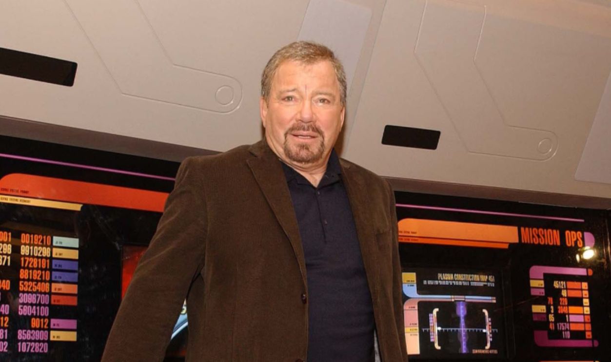 Former commander of the Starship Enterprise Captain Kirk (US actor William Shatner) sits on the bridge of a mock up of the Enterprise at Star Trek: The Adventure - an exhibition celebrating 35 years of the TV show and feature films - at Hyde Park.