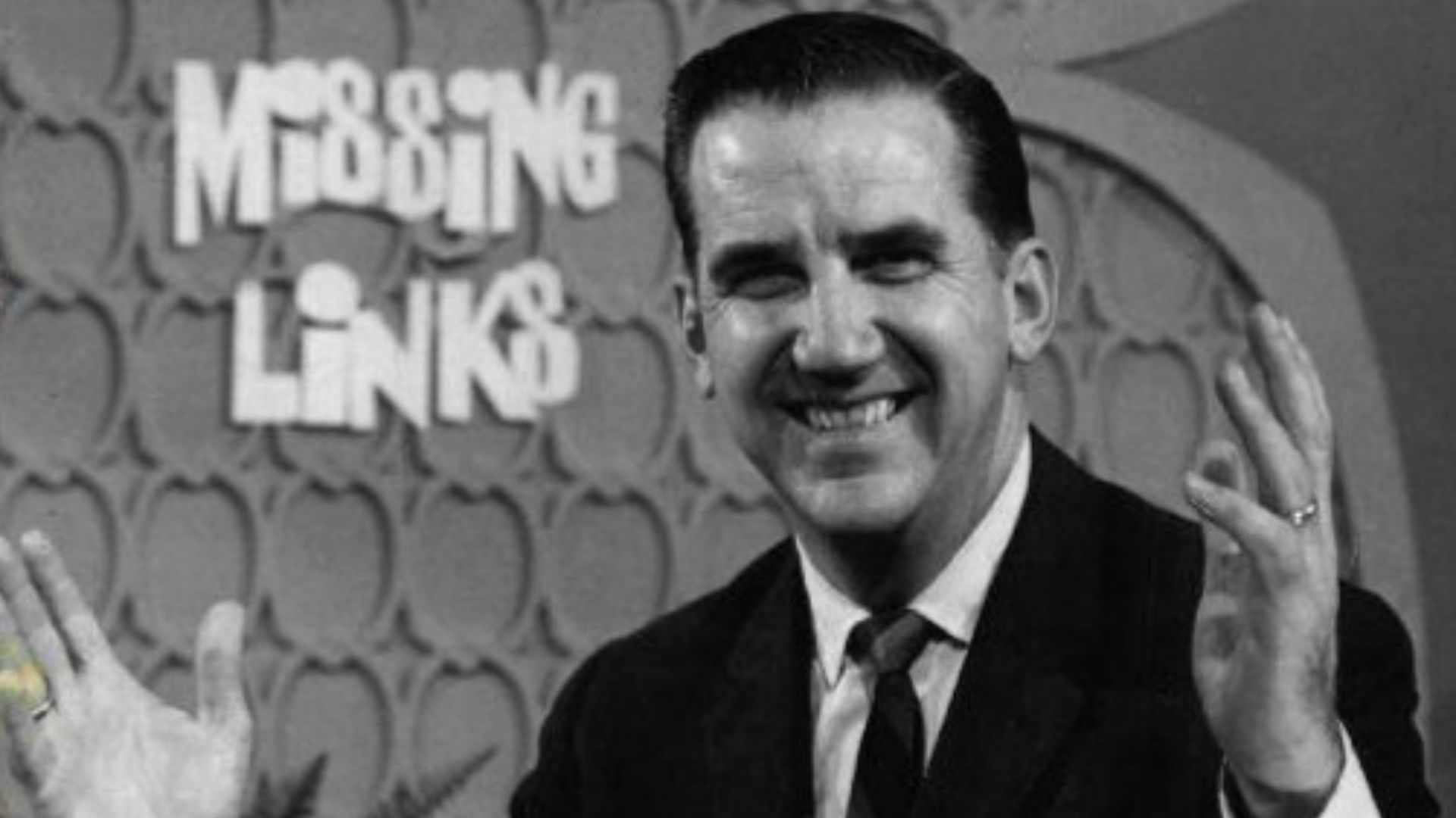 Photo of Ed McMahon as host of the television game show Missing Links.