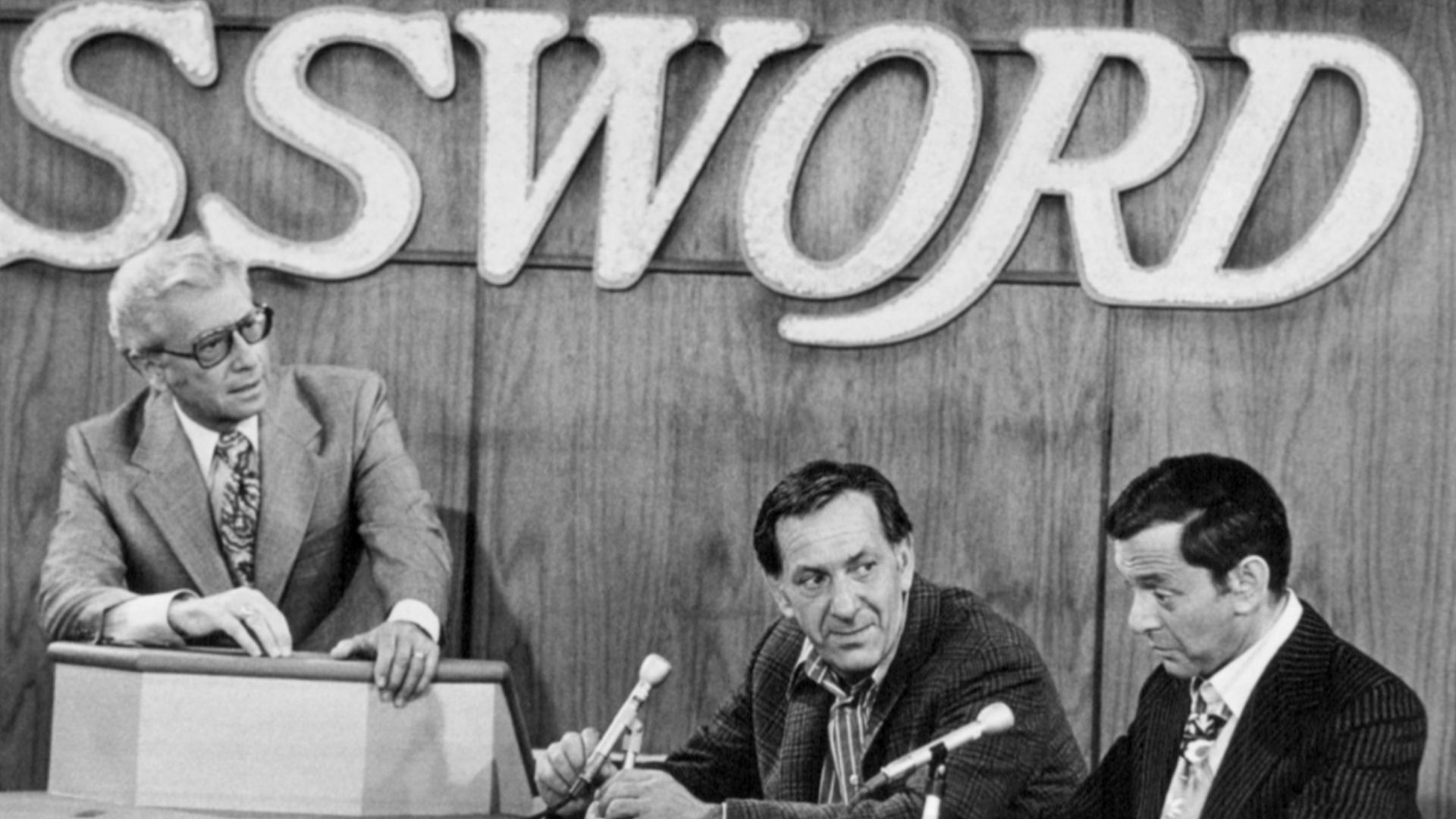 Photo of Allen Ludden, Jack Klugman as Oscar and Tony Randall as Felix from the television program The Odd Couple.  In this episode, Oscar and Felix appear on the television game show Password.