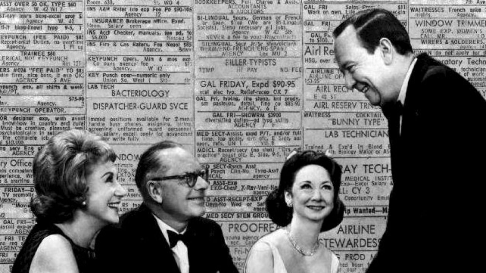 Photo from the 15th anniversary of the television game show What's My Line?.  The original panelists and host were still with the program at the time.  Panelists from left-Arlene Francis, Bennett Cerf, Dorothy Kilgallen.  Standing is the host, John Charle