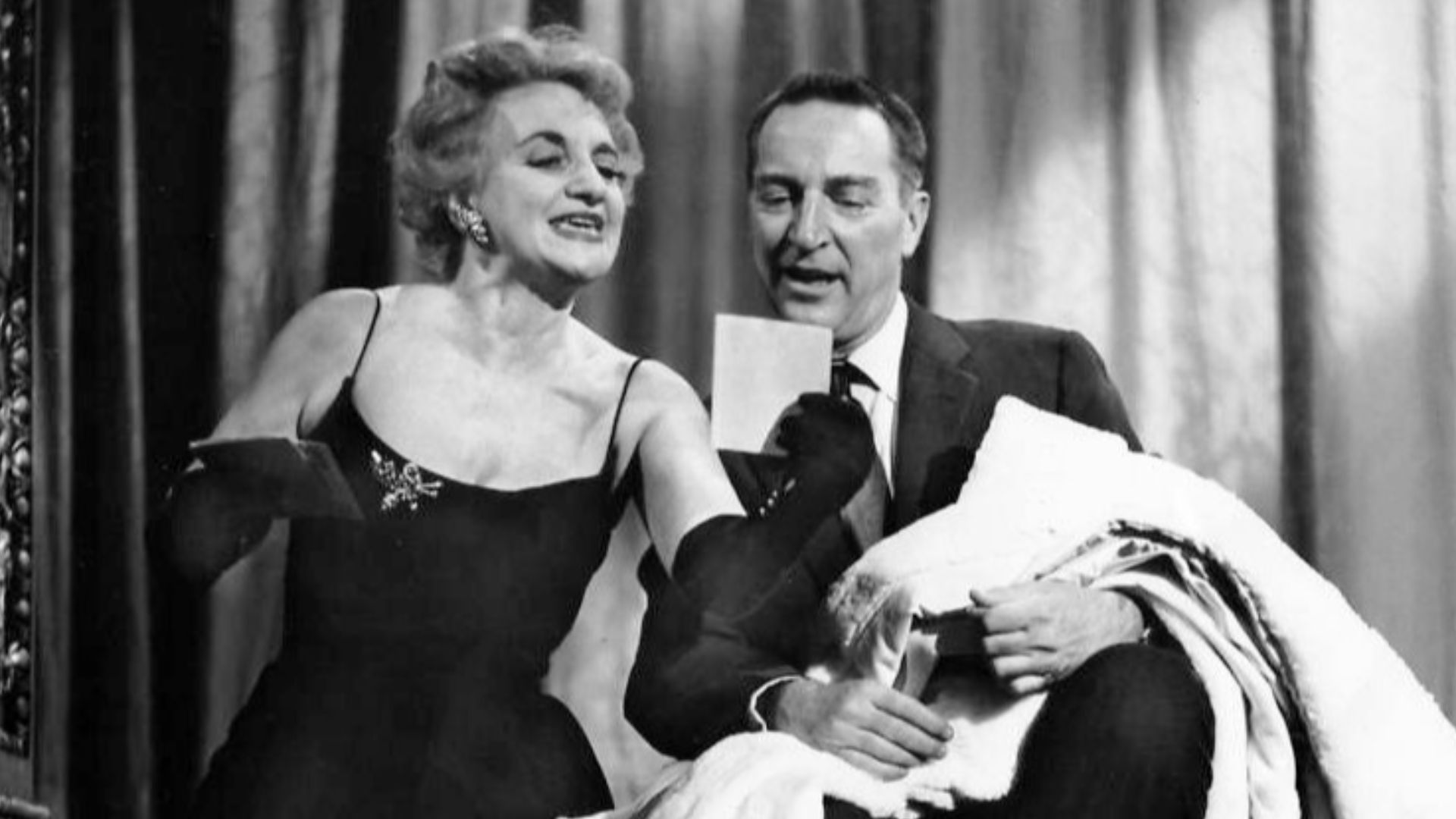 Publicity photo of actress Hermione Gingold and host Garry Moore from the television game show I've Got a Secret.