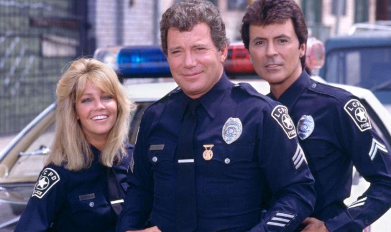 LOS ANGELES - SEPTEMBER 1: T.J. Hooker, a CBS television police drama. Pictured from left is Heather Locklear (as Officer Stacy Sheridan), William Shatner (as Sergeant T.J. Hooker), James Darren (as Officer Jim Corrigan). Image dated September 1, 1985.