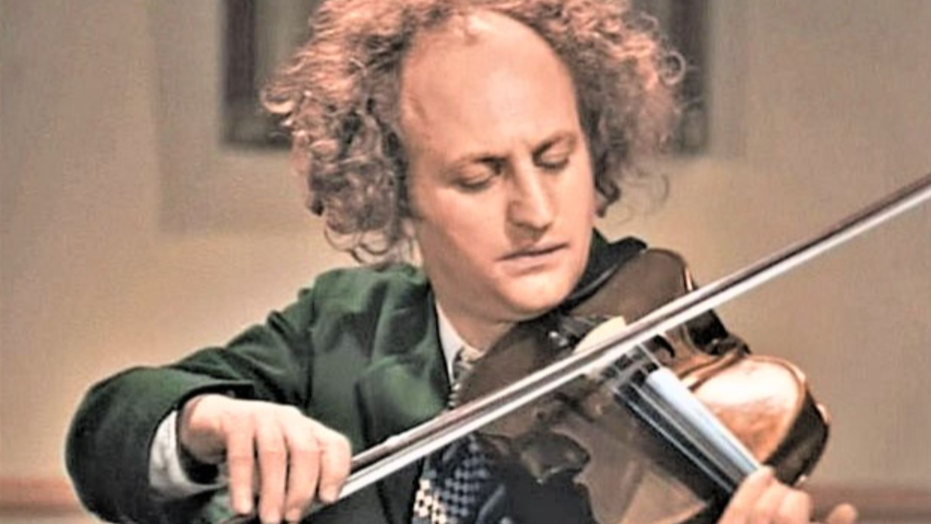Colorized photo of Larry Fine in the 1936 film Disorder in the Court
