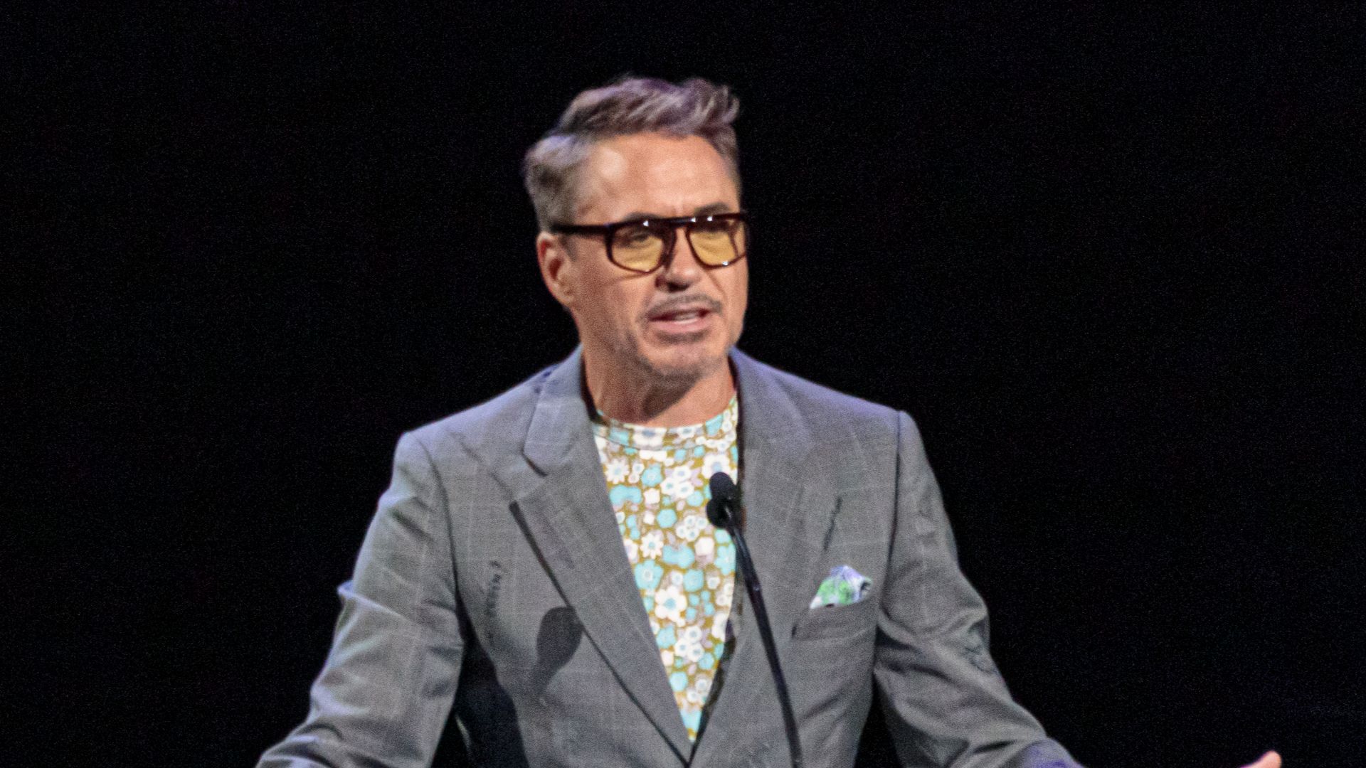 Actor Robert Downey Jr. talking on stage at the 2019 Disney Legends Awards Ceremony