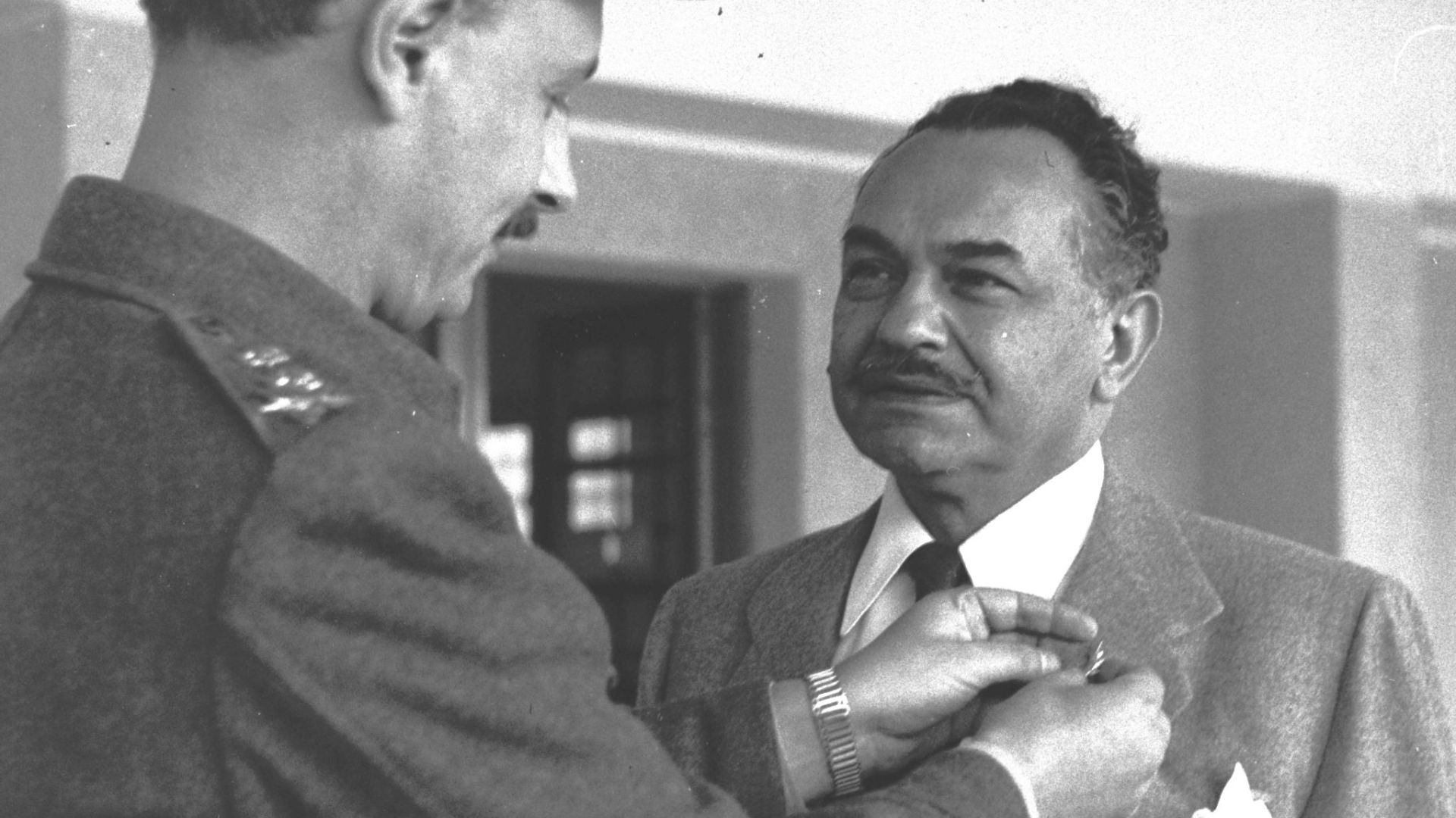 Yigal Yadin, Chief of Staff of the IDF presenting a decoration to actor Edward G. Robinson