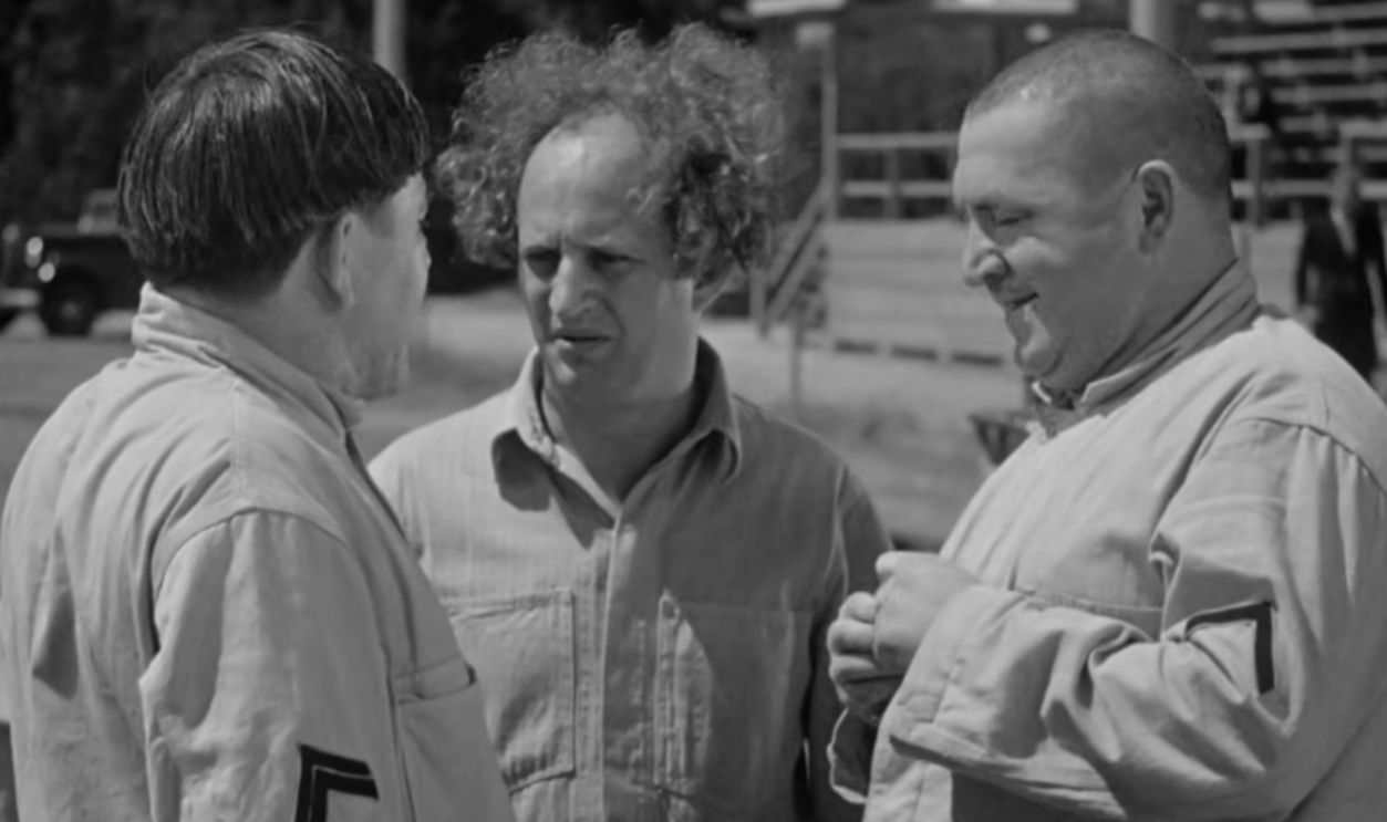 Screenshot from Start Cheering (1938) 