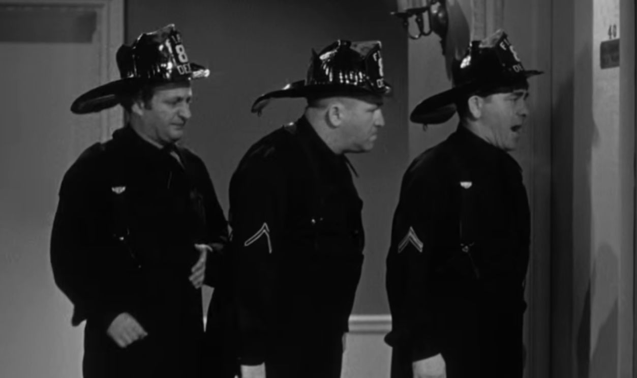 Screenshot from Start Cheering (1938) 