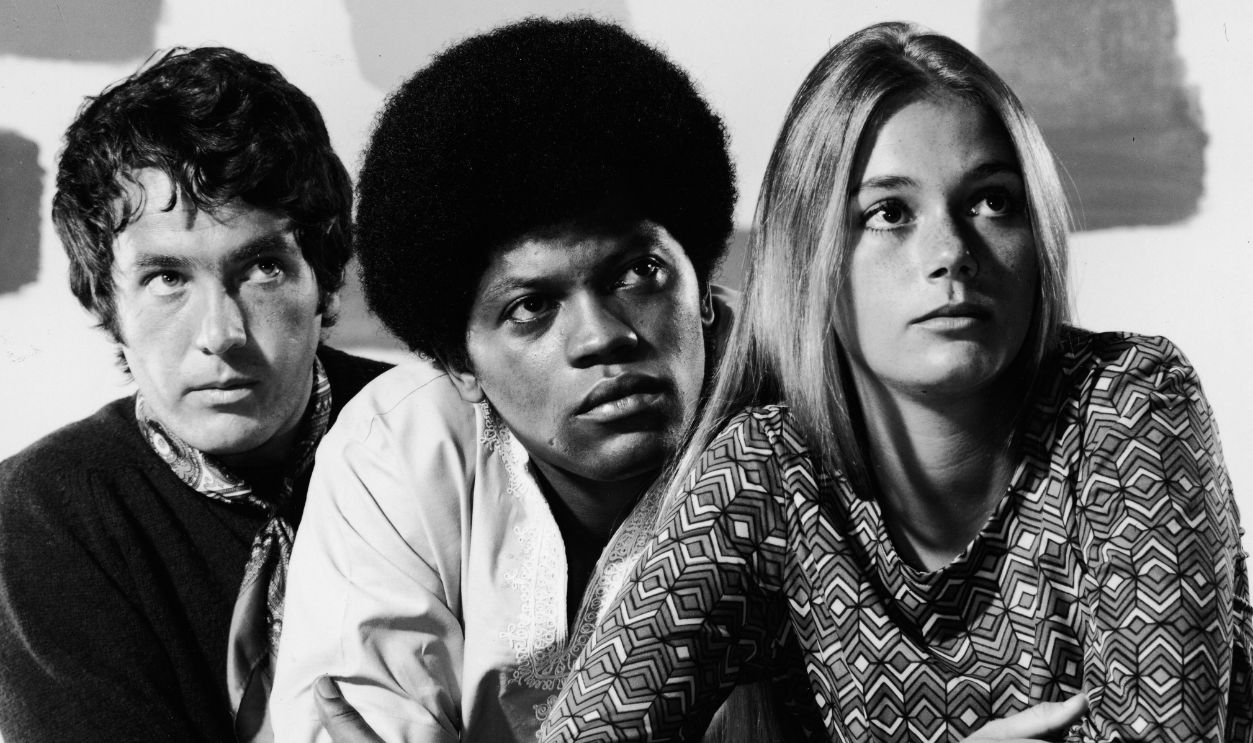 Promotional studio portrait of actors Michael Cole (L), Clarence Williams III and Peggy Lipton for the television series, 'The Mod Squad,' c. 1968.